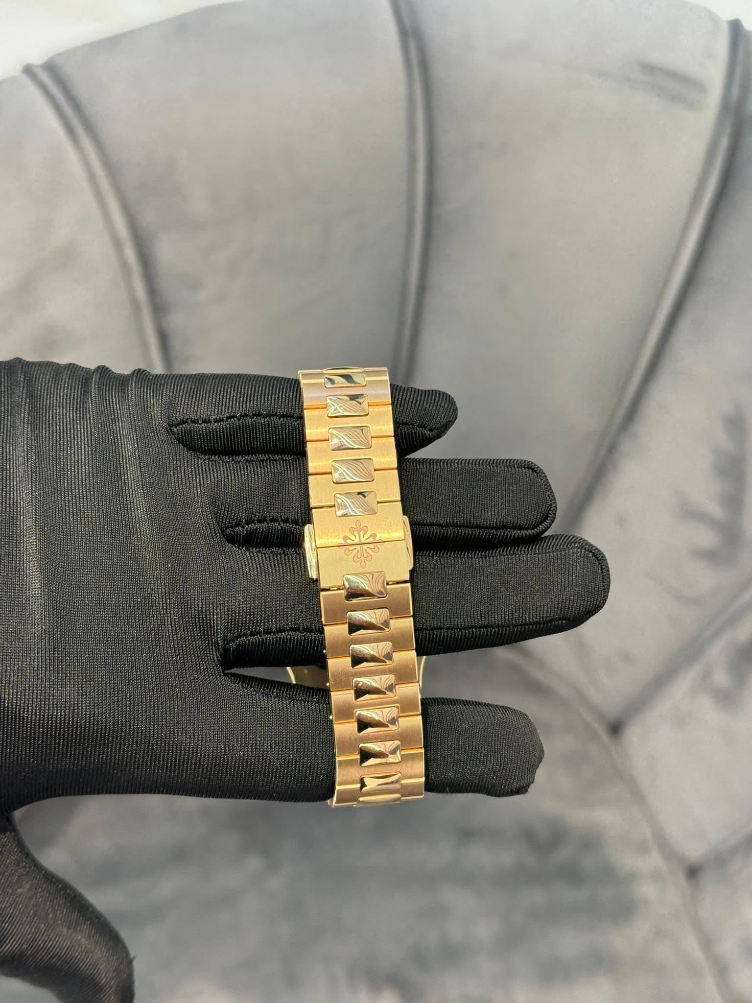 May be an image of wrist watch and jewelry
