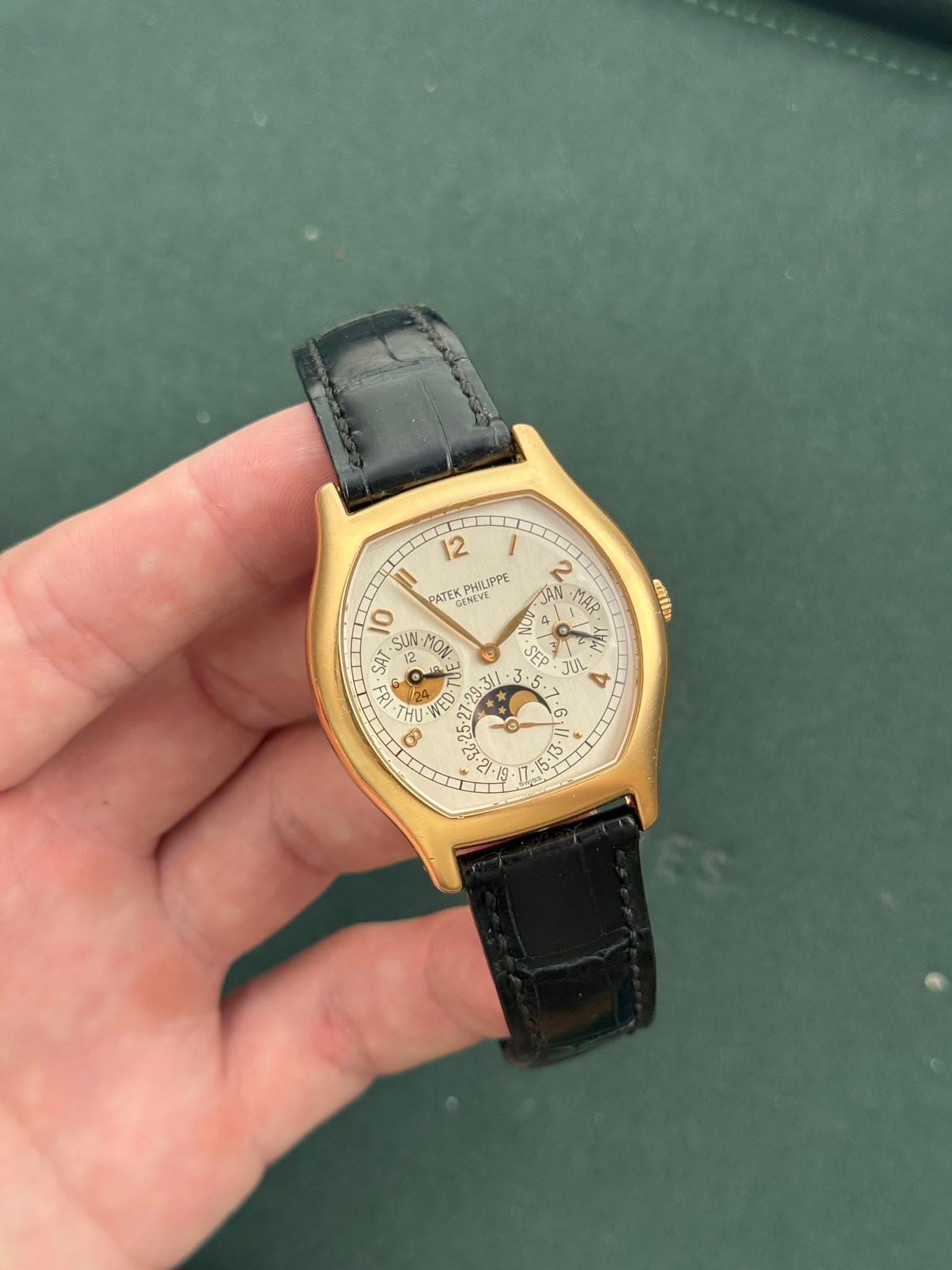 May be an image of wrist watch and text