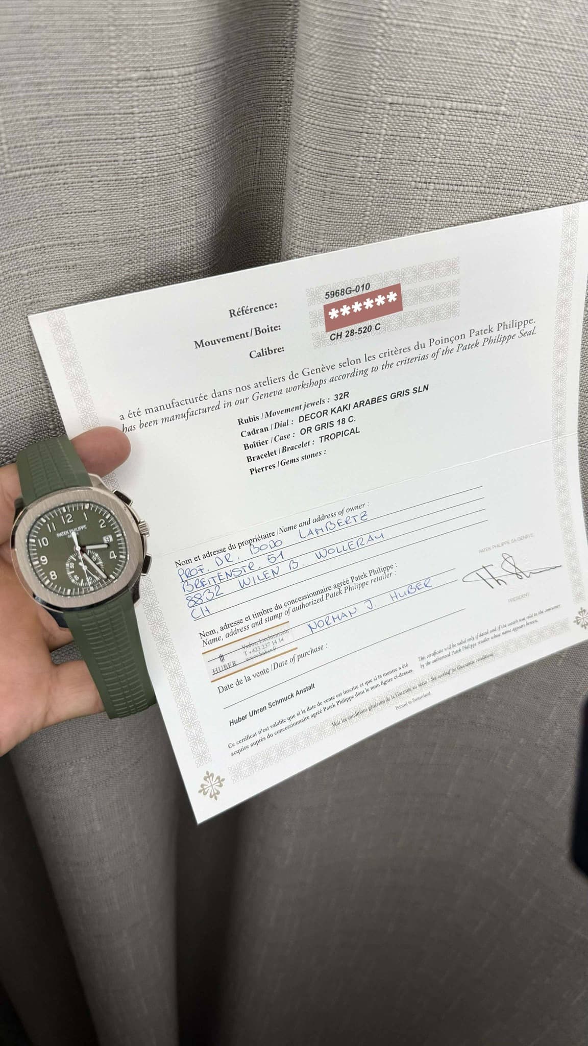 May be an image of wrist watch, ticket stub and text