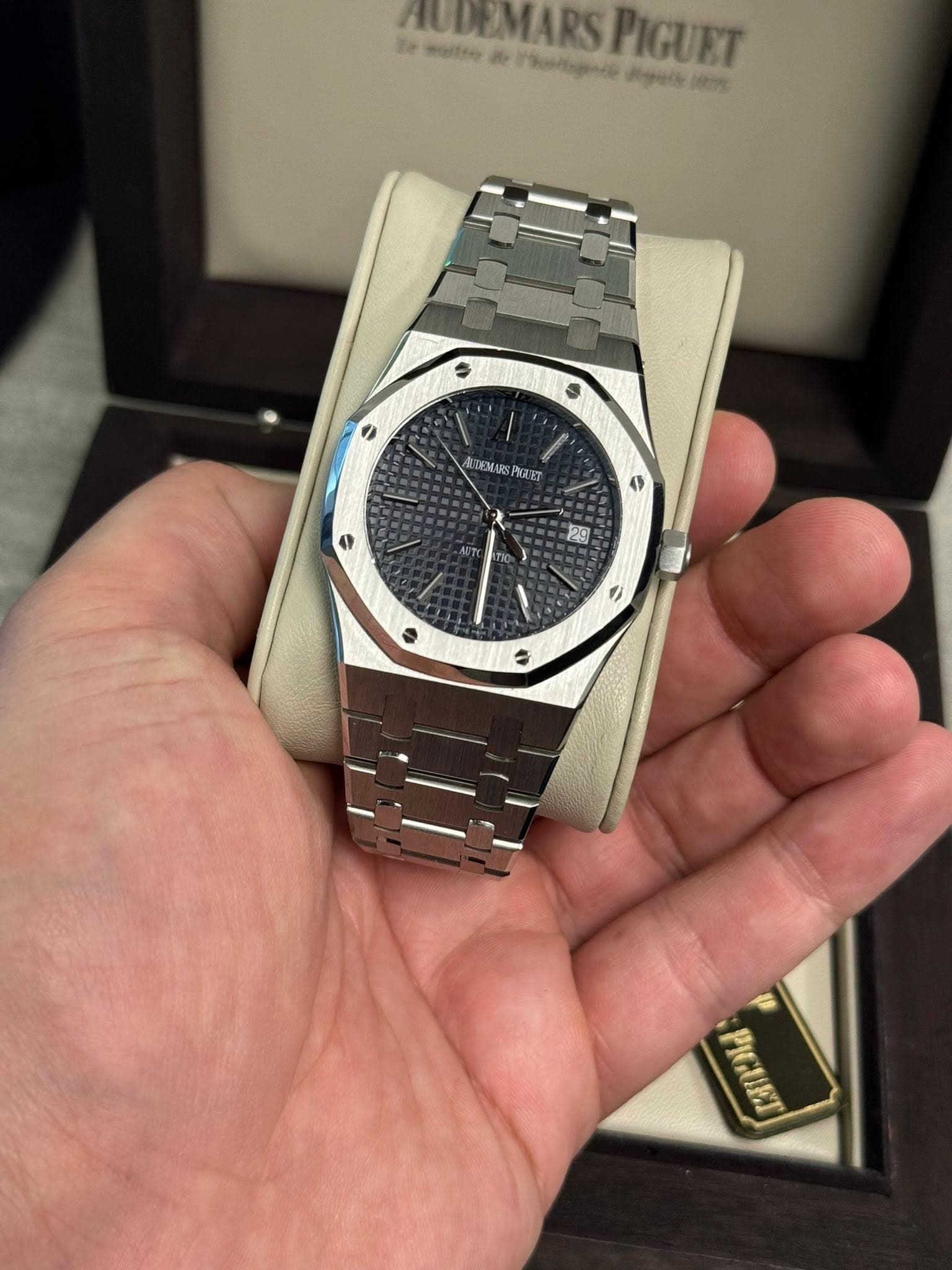 May be an image of wrist watch and text