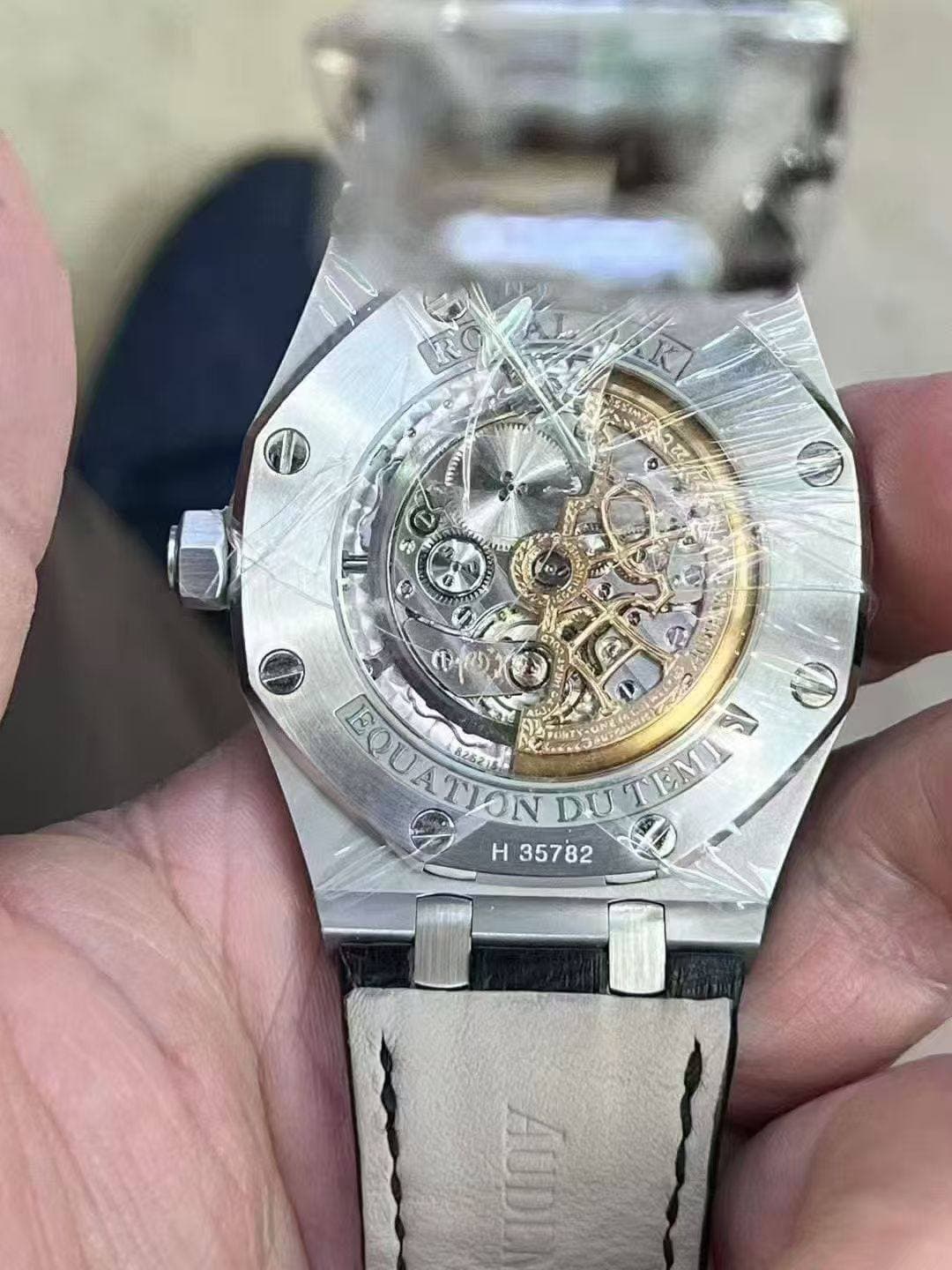 May be an image of wrist watch and text that says 'F 2 අාම 2(( EQUATION BQUATION EOU ATION 82821 RS O DU S a TEMI Η 35782'