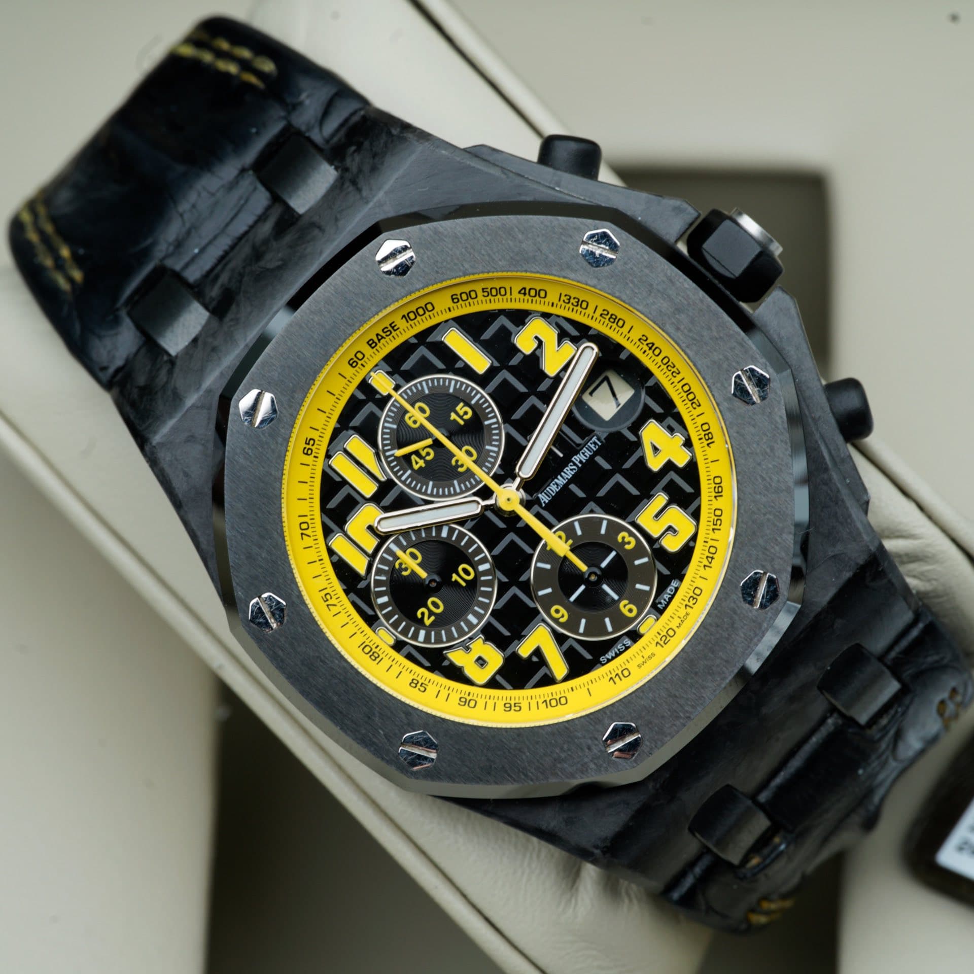 May be an image of wrist watch and text