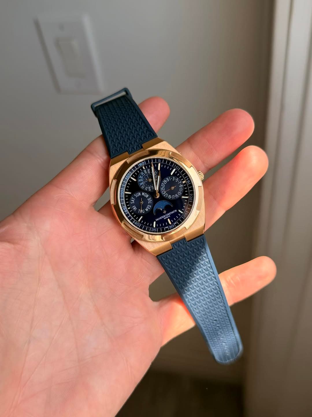 May be an image of wrist watch and text