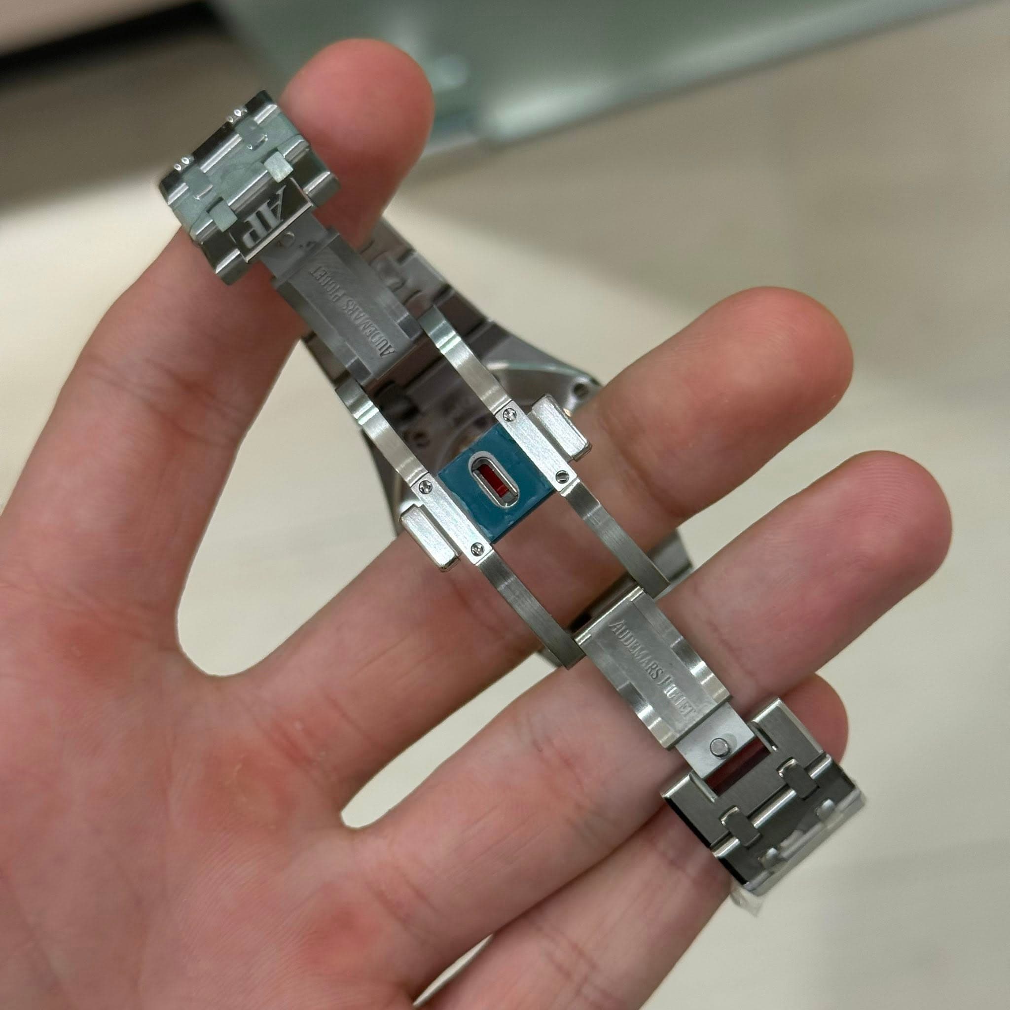 May be an image of wrist watch and text