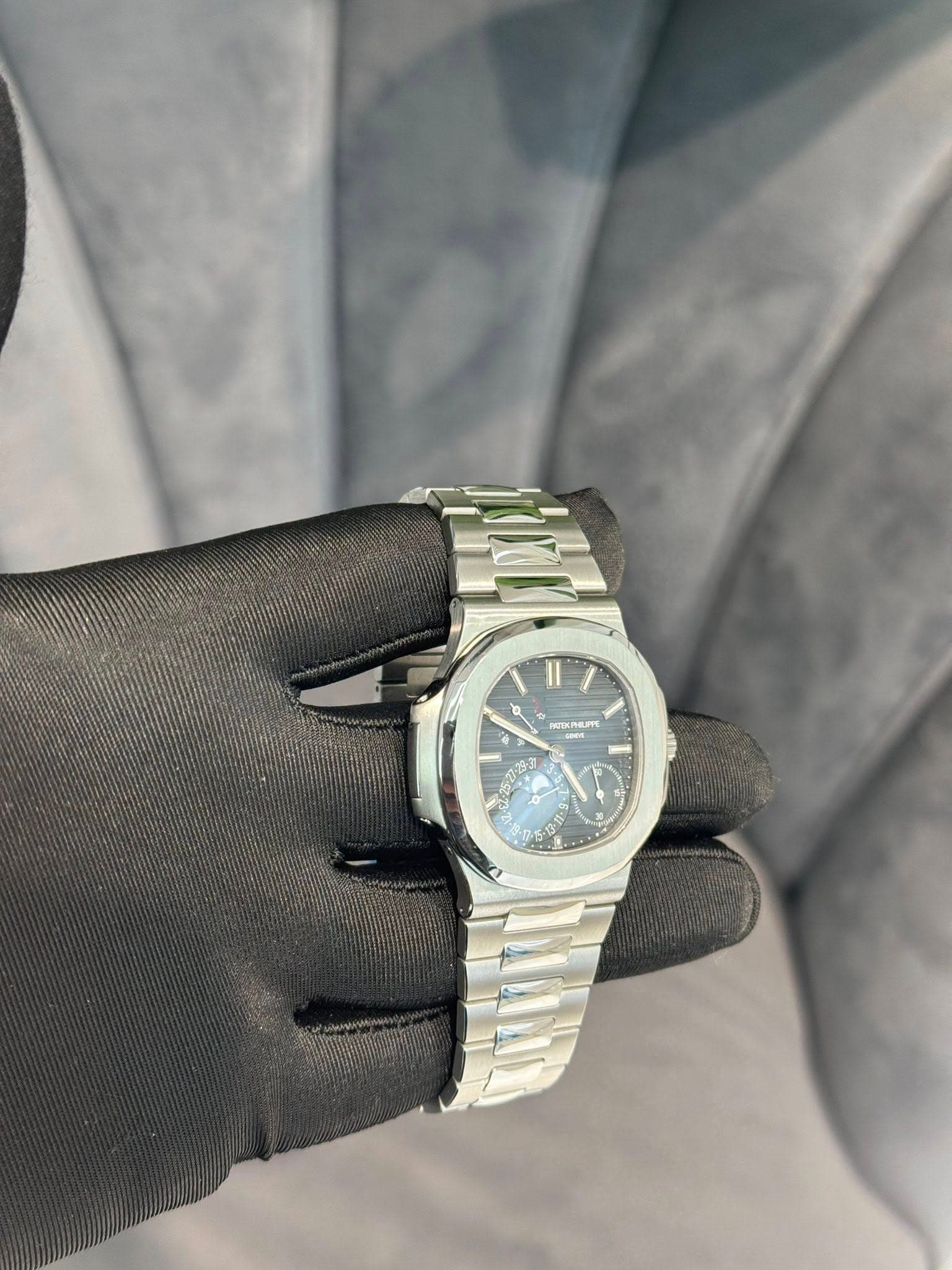 May be an image of wrist watch and text