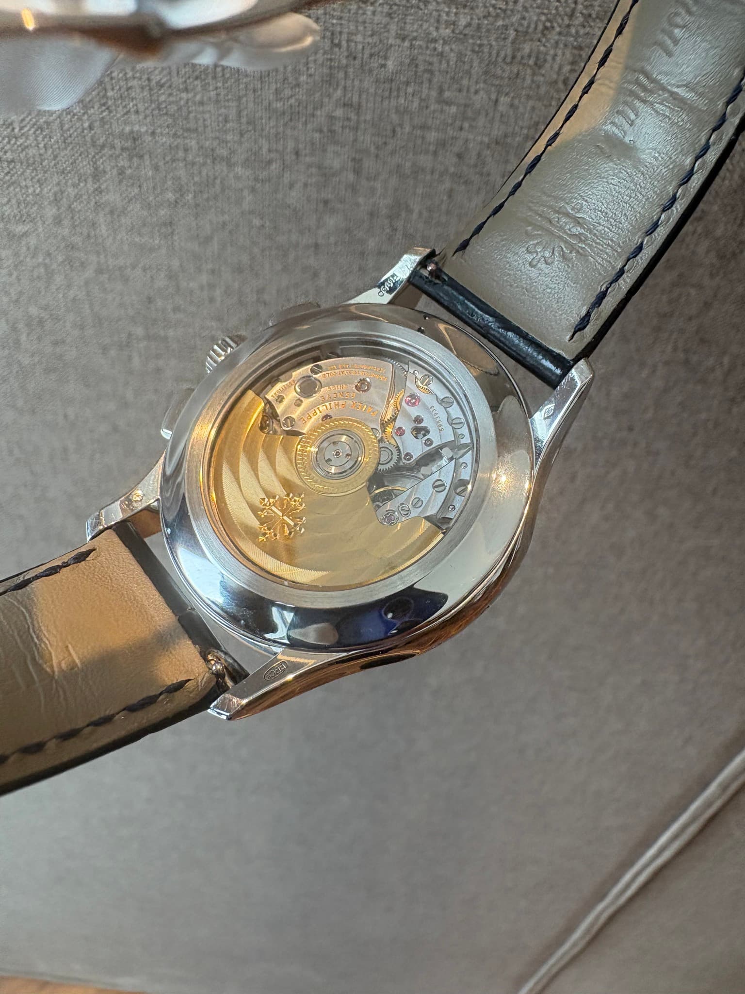 May be an image of wrist watch and text