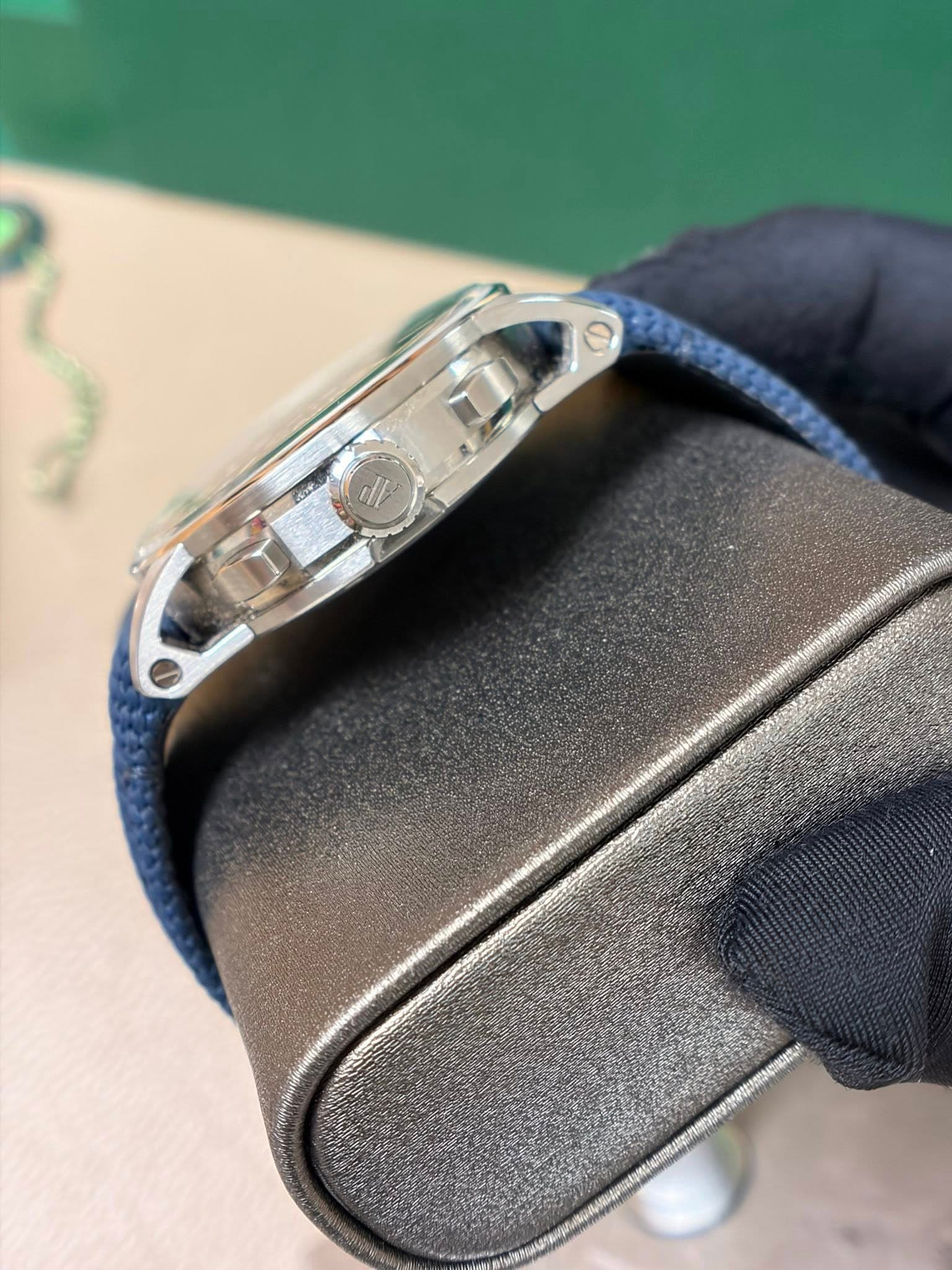 May be an image of wrist watch and text