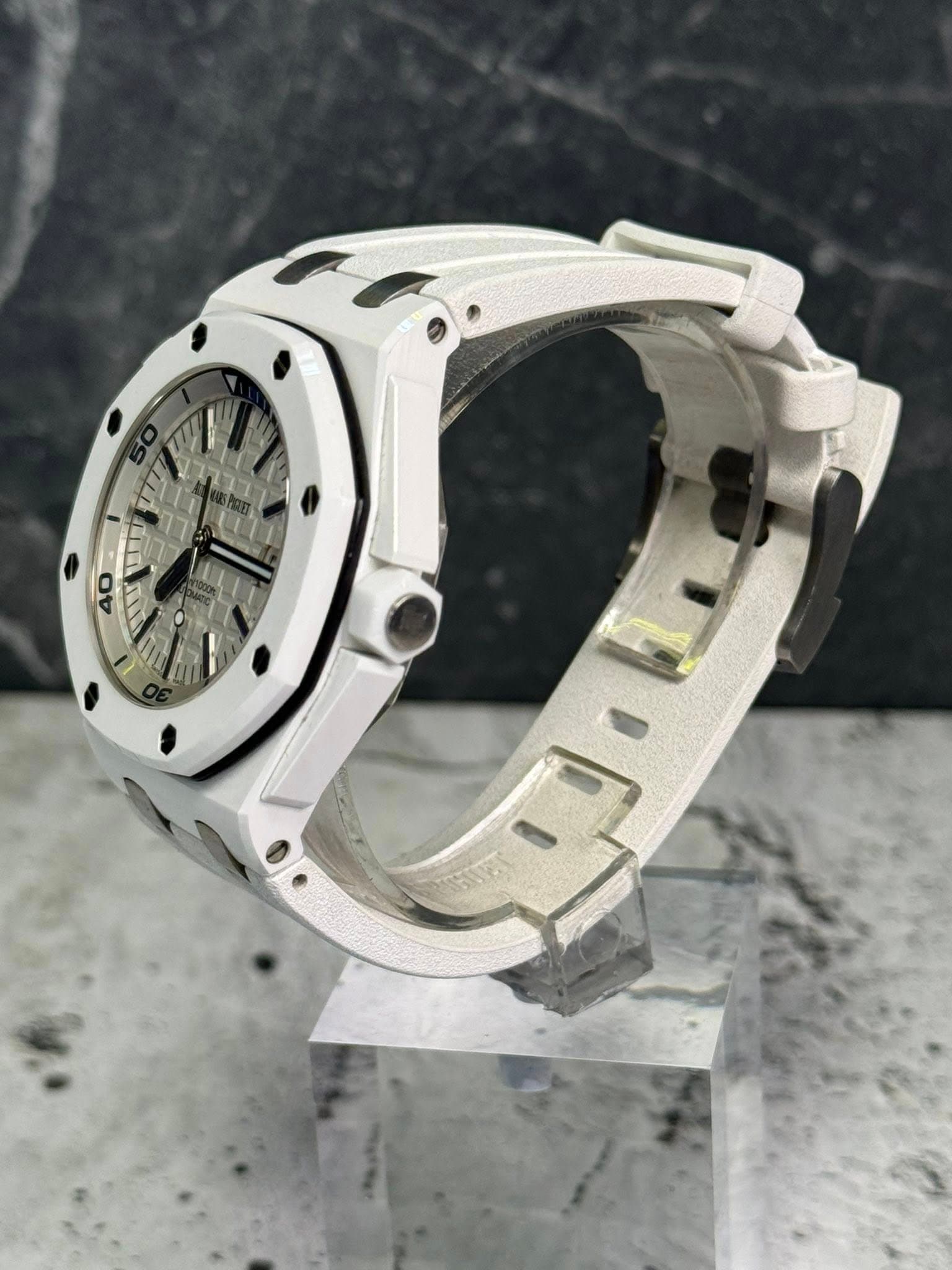 May be an image of wrist watch and text