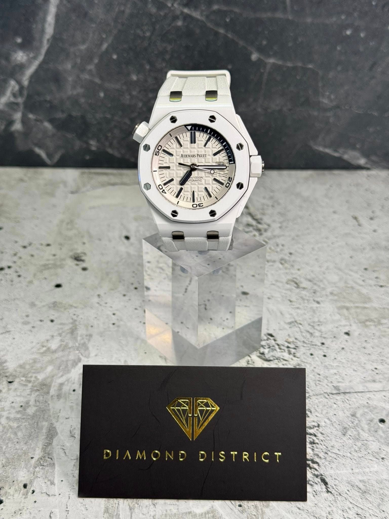 May be an image of wrist watch and text that says '50 m ABEMNUS GIFT= ب N A 0 20 م 30 DIAMONDDI DIAMONDDISTRICT STRICT'