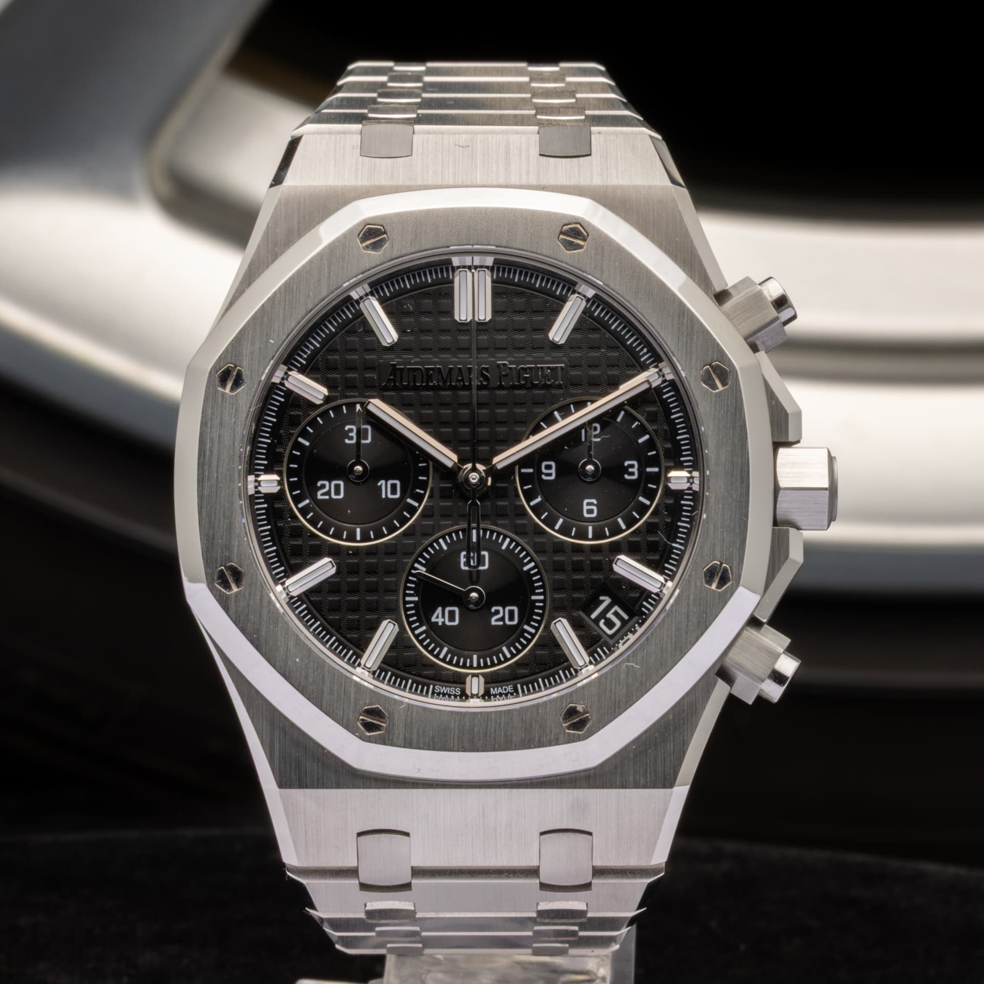 May be an image of wrist watch and text