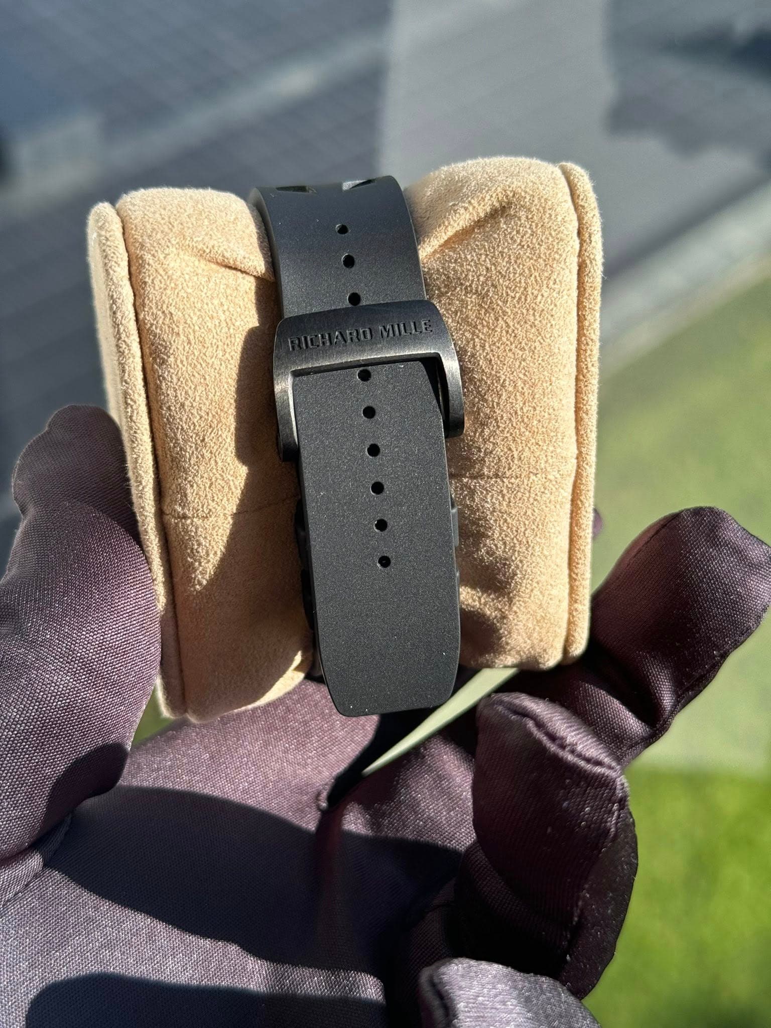May be an image of saddle-stitched leather, digital watch and leather