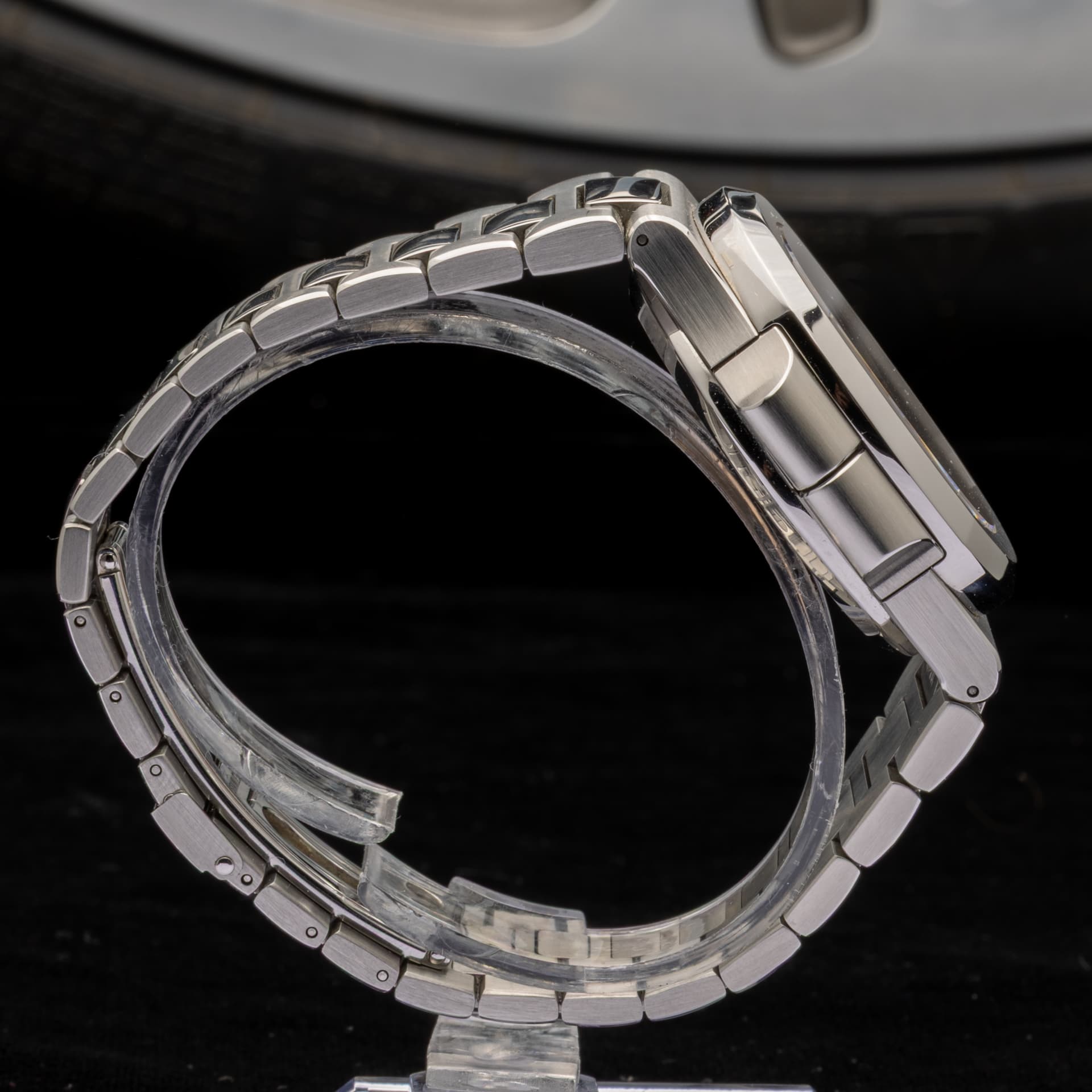 May be an image of wrist watch and text