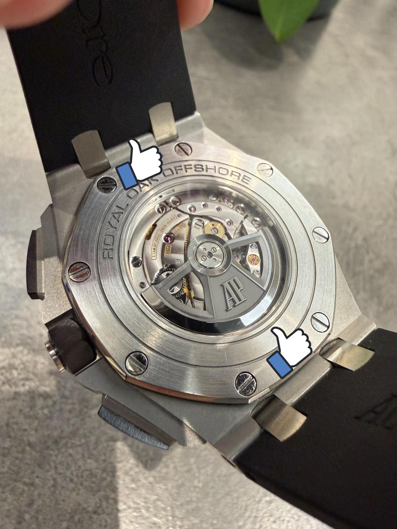 May be an image of wrist watch and text