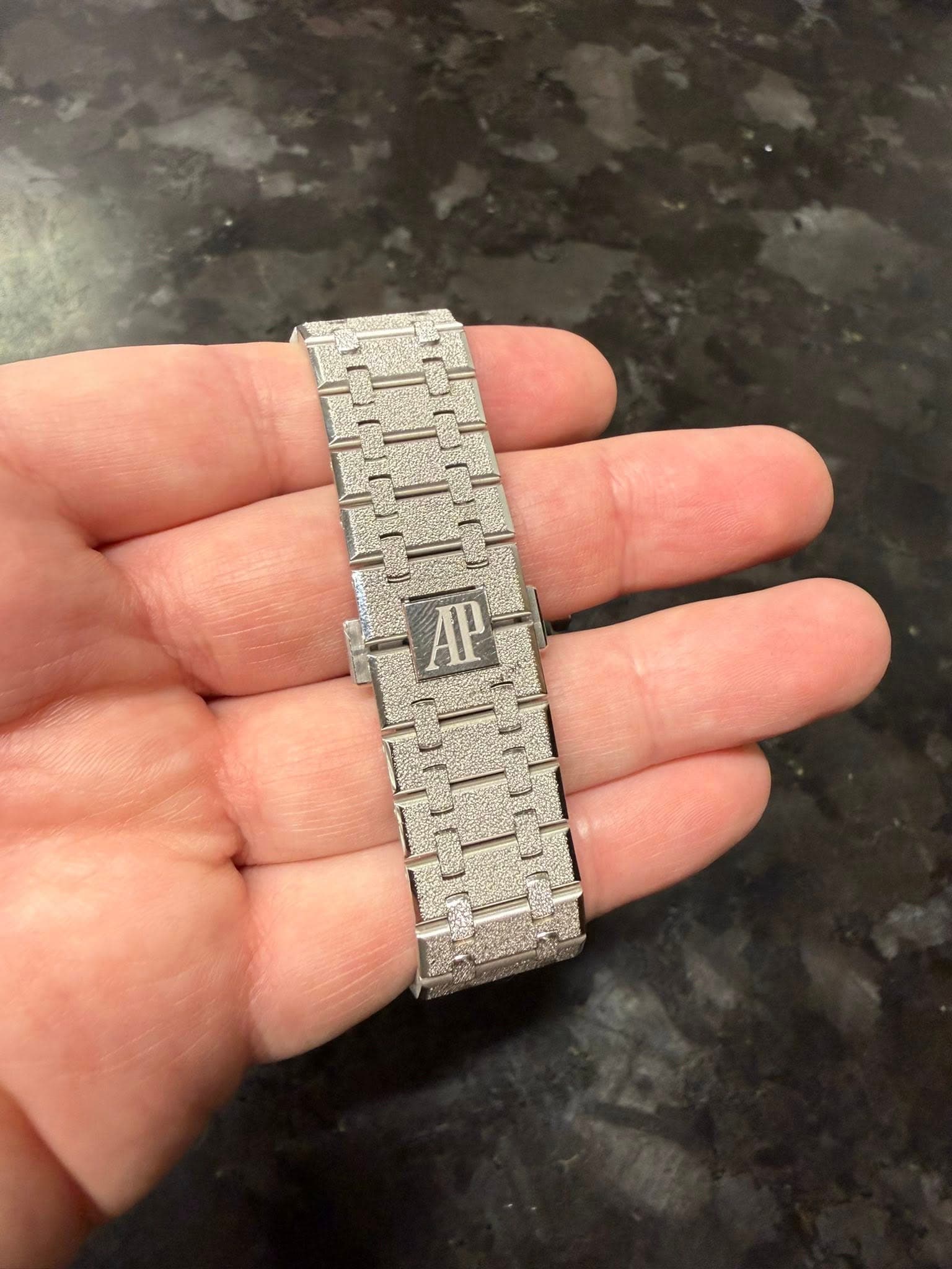 May be an image of wrist watch