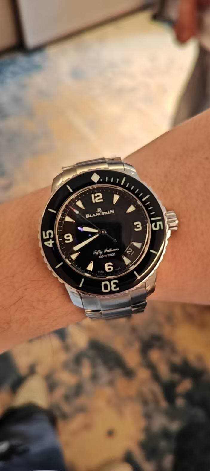 May be an image of wrist watch and text that says '12 F BL NCPAIN PAIN ትርትት திவமம் 6 οε'