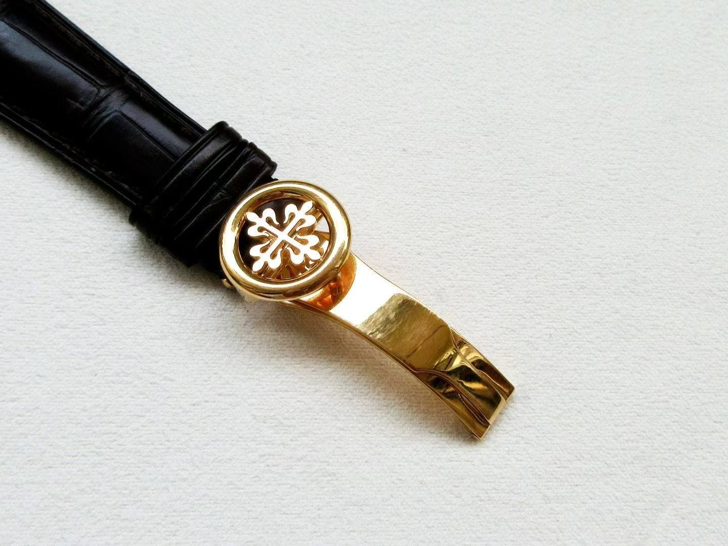 May be an image of wrist watch