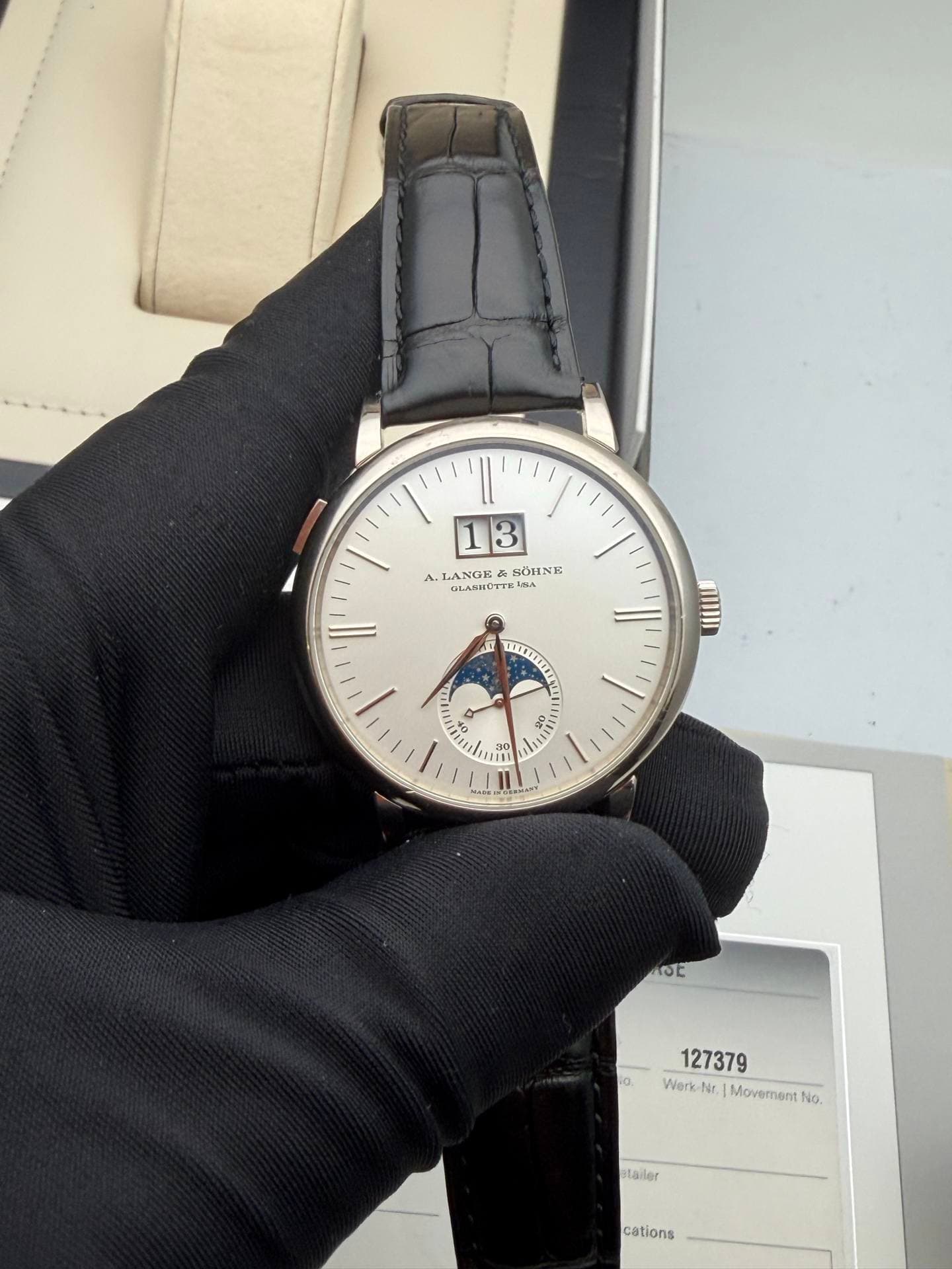 May be an image of wrist watch and text