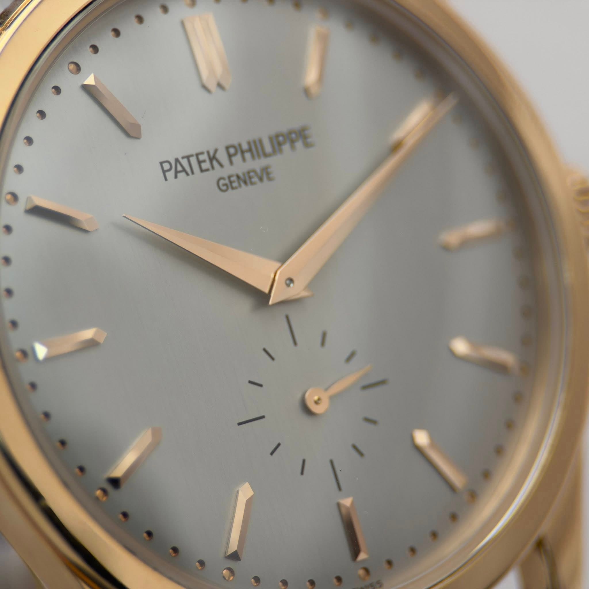 May be an image of wrist watch and text that says 'PATEK PATEK PATEKPHILIPPE PHILIPPE GENEVE'
