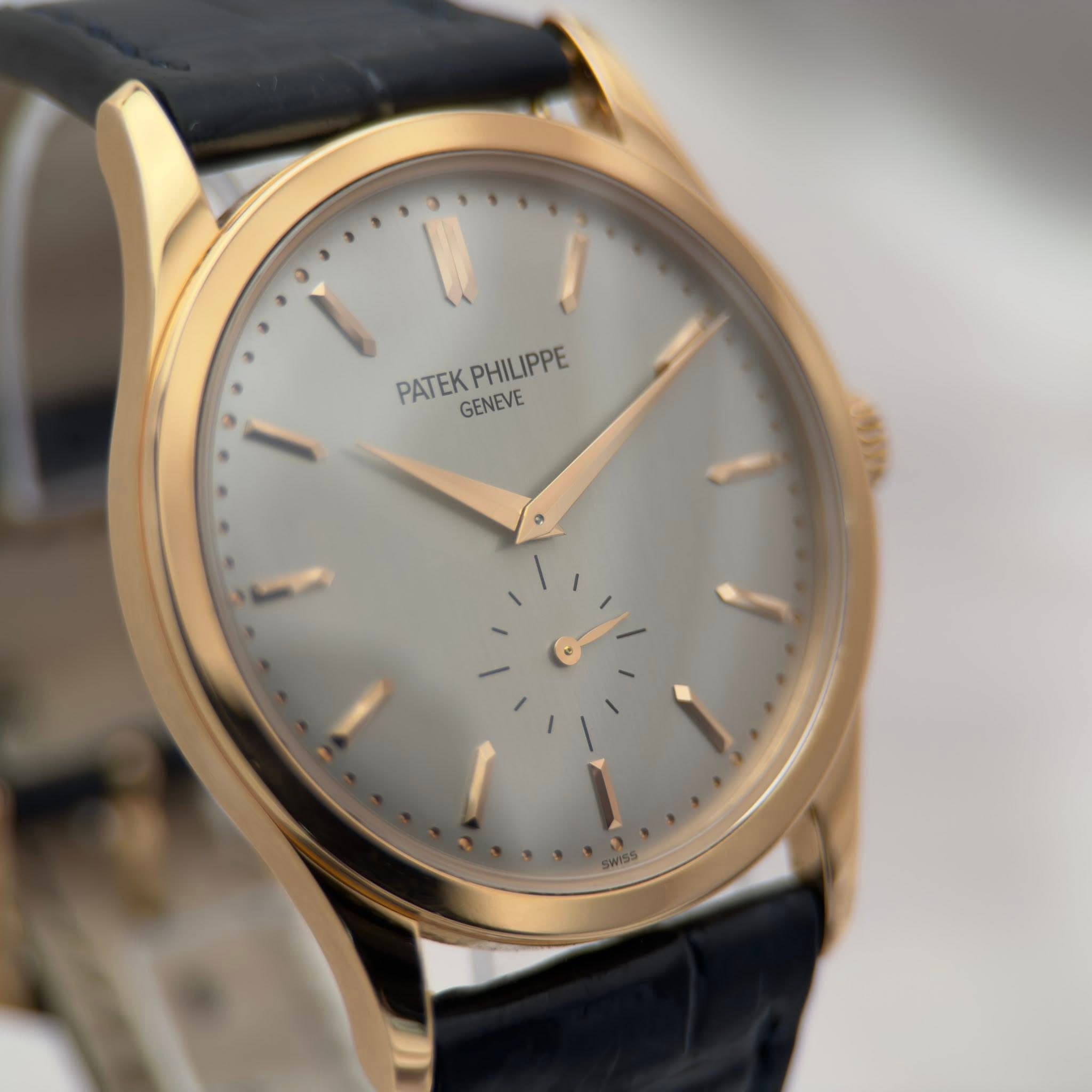 May be an image of wrist watch and text that says 'PATEK PATEKPHILIPPE PHILIPPE GENEVE'