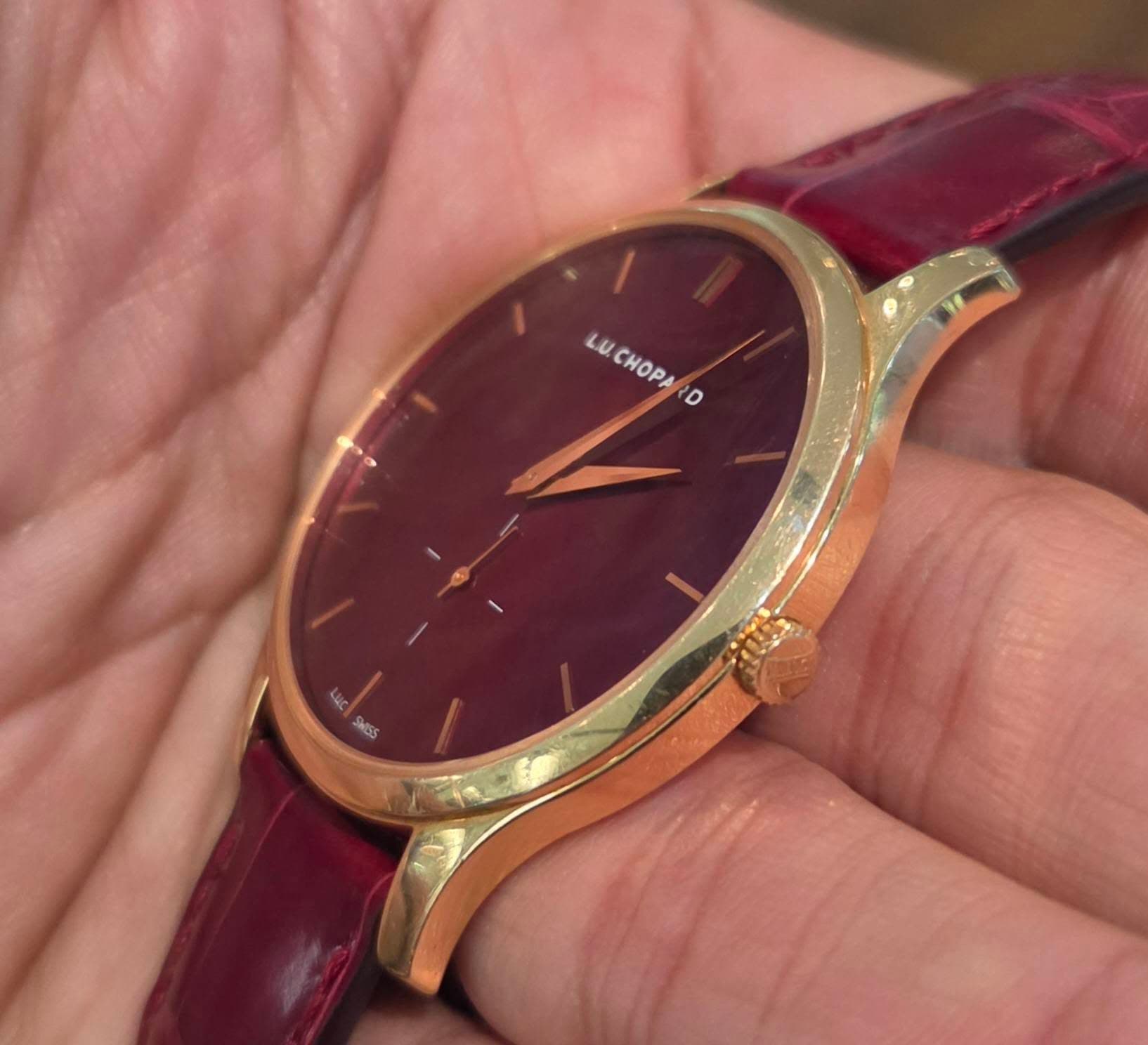 May be an image of wrist watch and text that says 'LU.CHOPA D LU LUCHOPA'