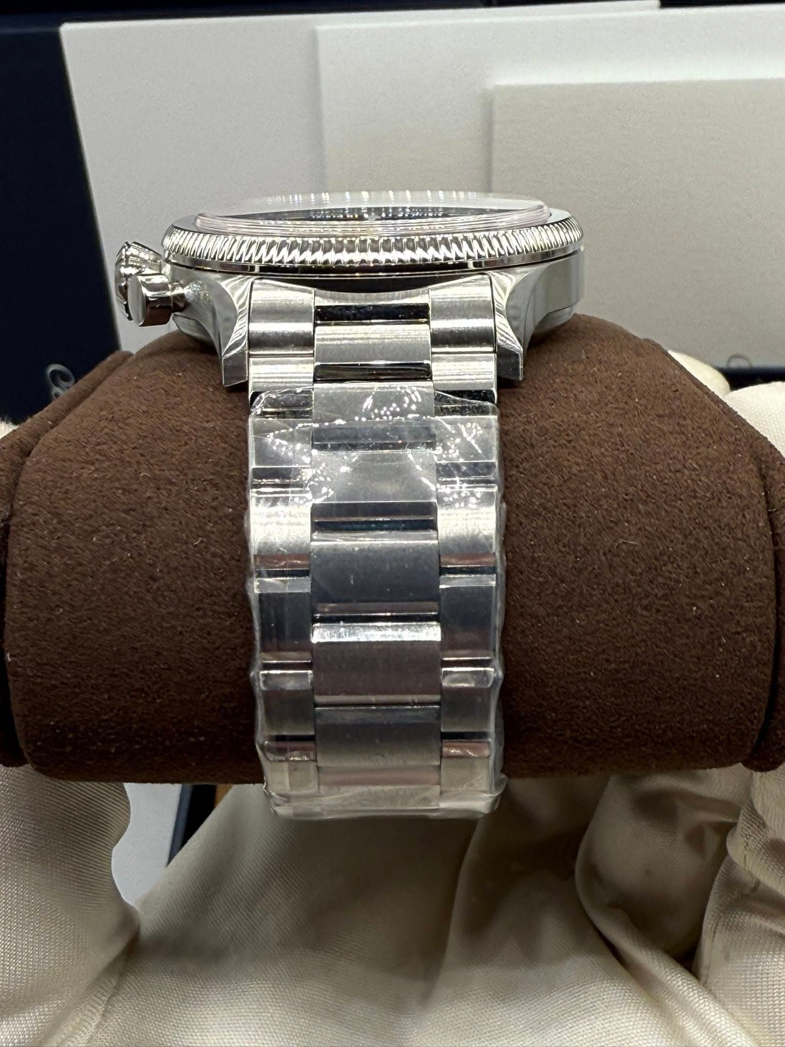 May be an image of wrist watch and text