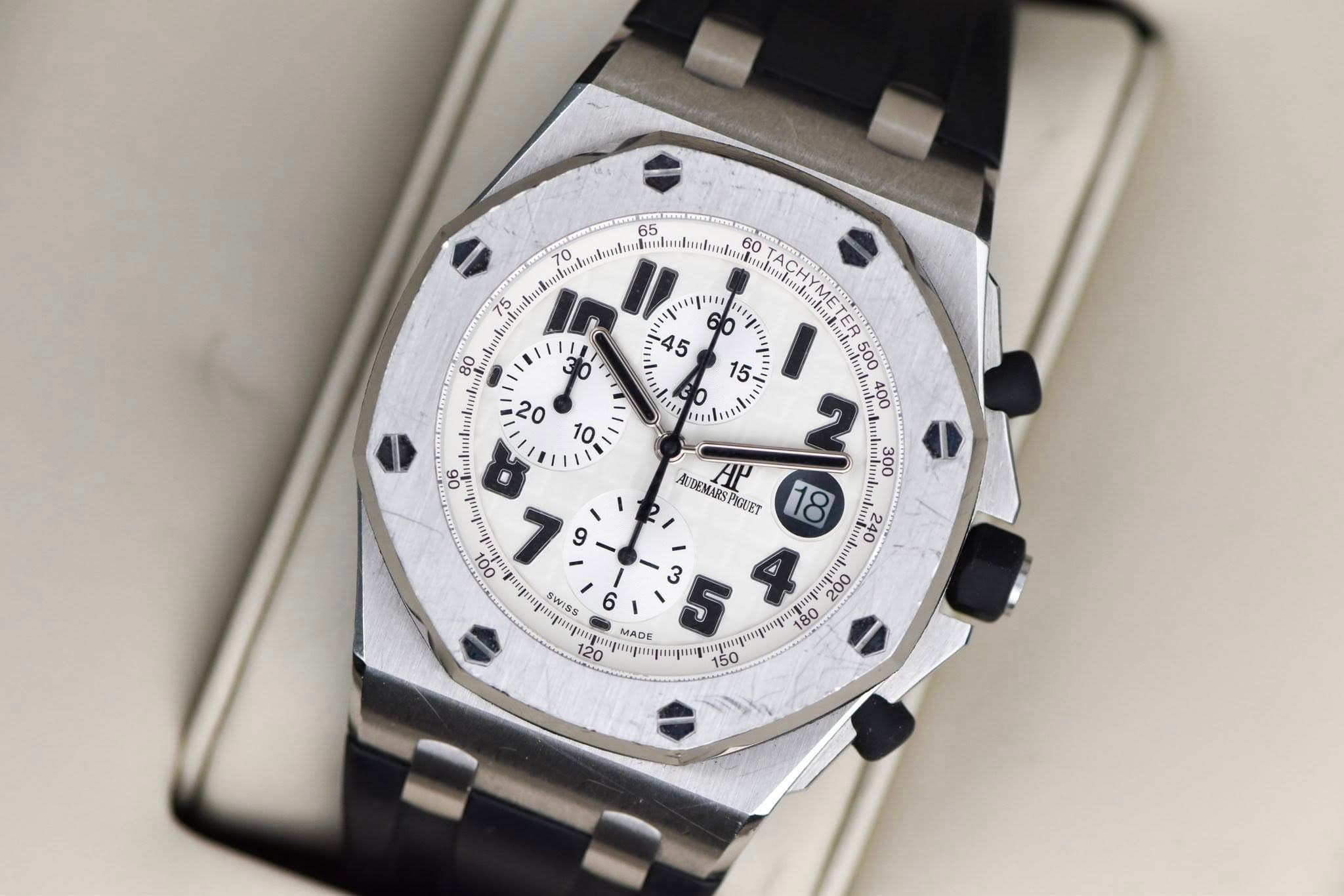 May be an image of wrist watch and text