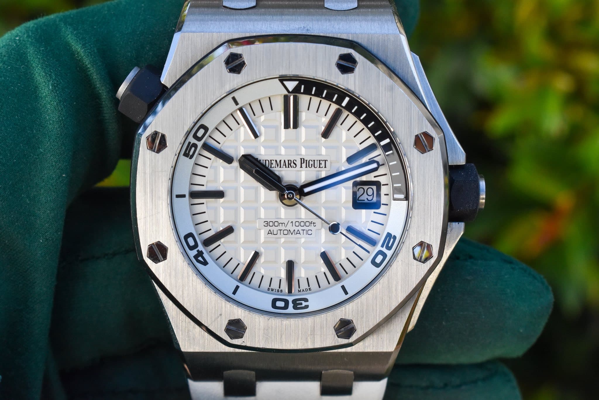 May be an image of wrist watch and text that says '50 DEMARSPIGUET DEMARS PIGUET 29 300m/1000ft AUTOMATIC AUTO AUTOMATIC C 300m/ OOOft IC 40 I 20 WISS MADE ΞΞ΅'