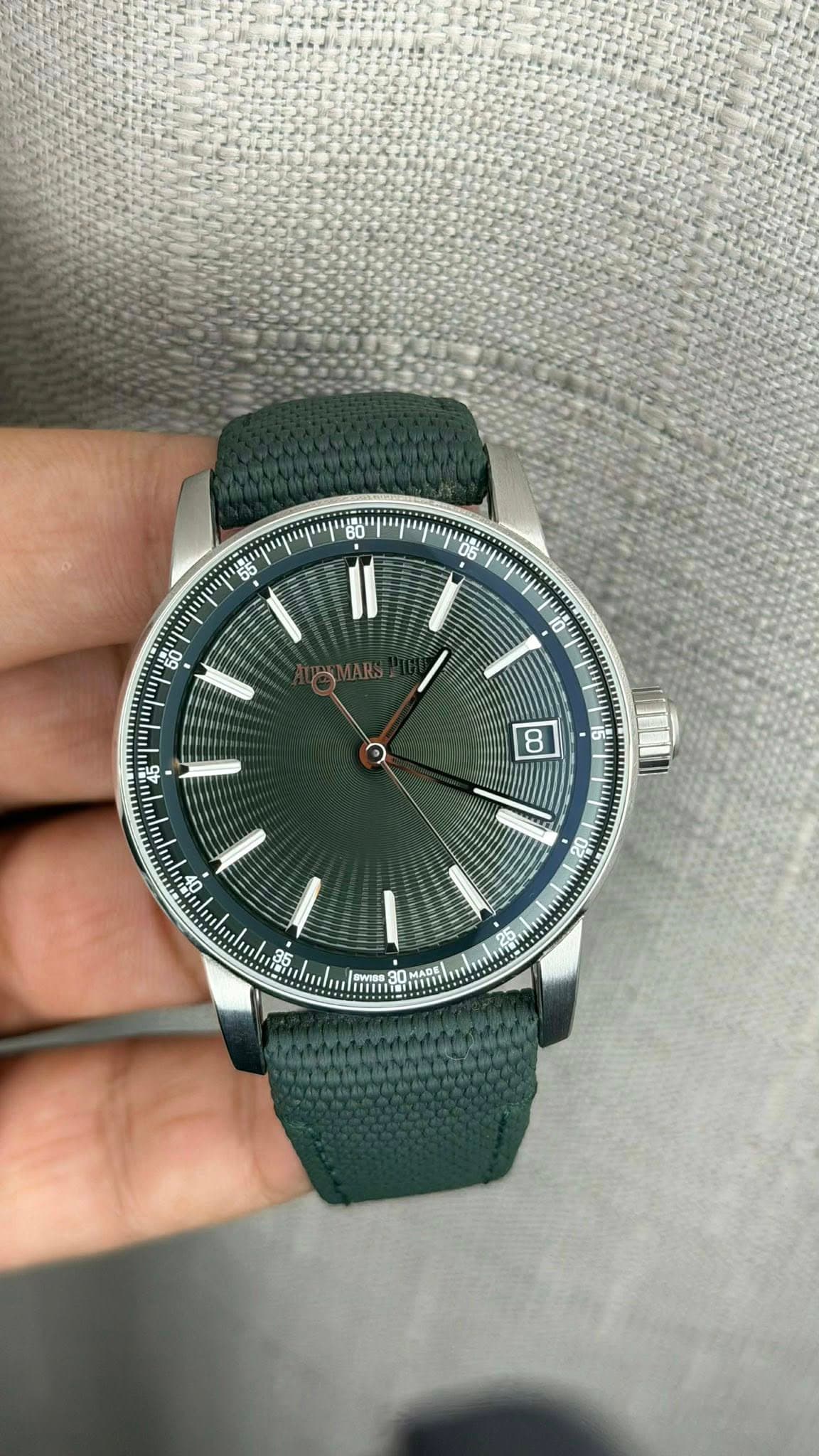 May be an image of wrist watch