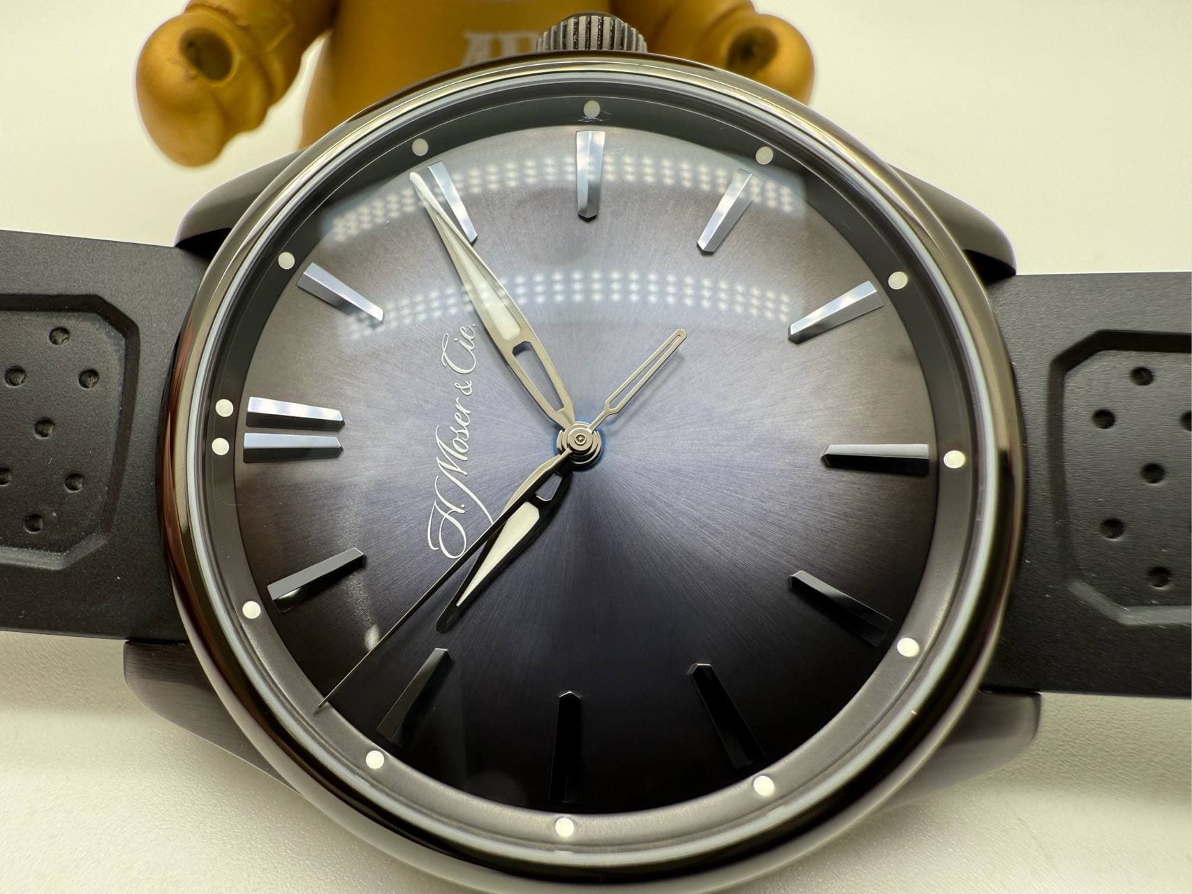 May be an image of wrist watch and text