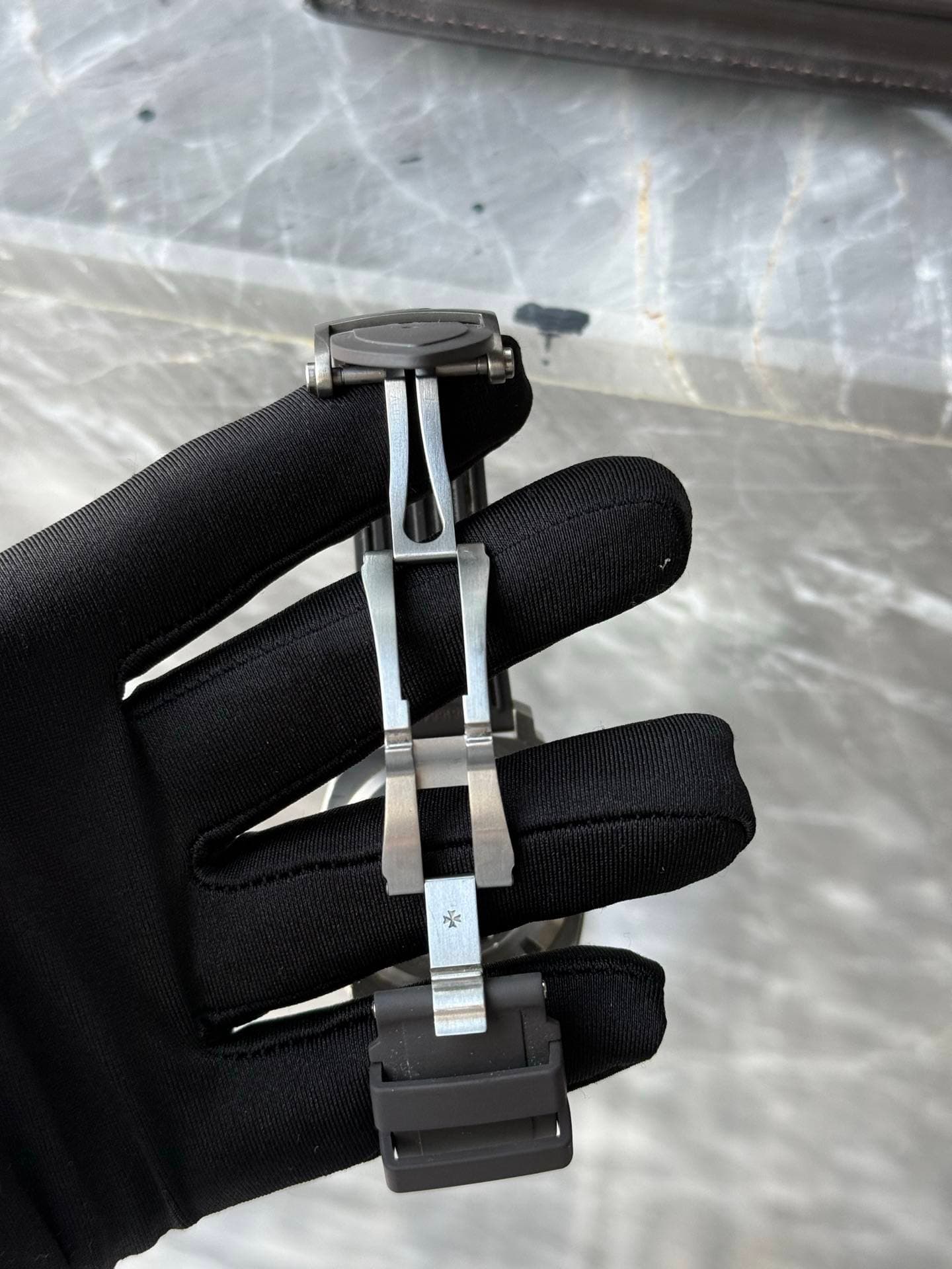 May be an image of digital watch and knife