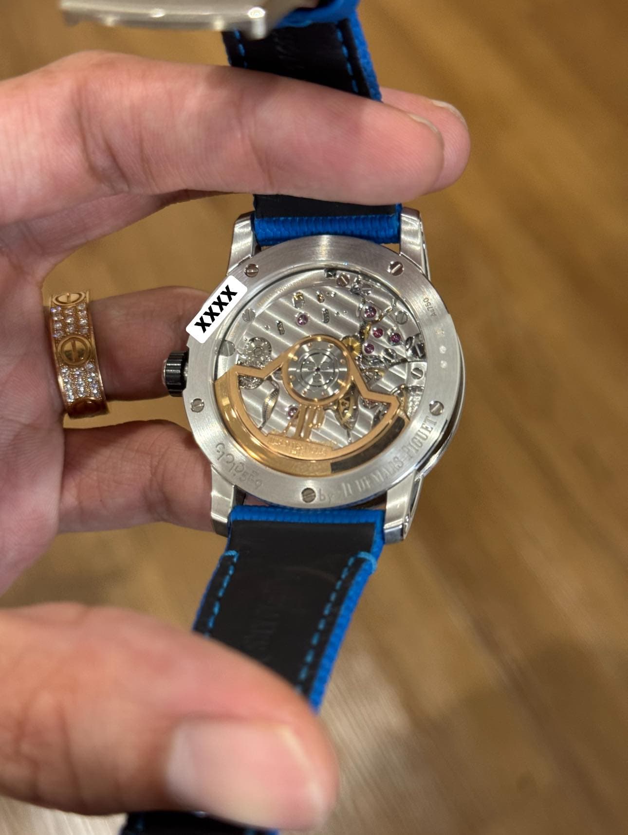 May be an image of wrist watch and text