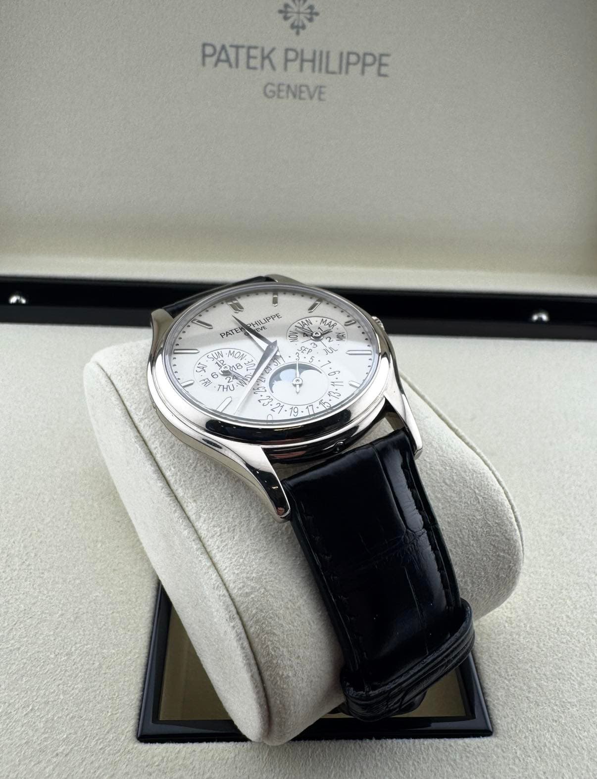 May be an image of wrist watch and text