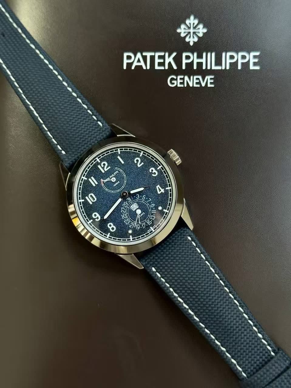 May be an image of wrist watch and text that says 'PATEK PHILIPPE GENEVE 康謝 12 UP I1 O peKK 10 اگر AR و C ጋርግ 1 8 -OE 2 က 4 3. 7 6 I + 도 ת 2'