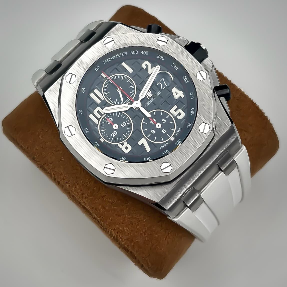May be an image of wrist watch and text