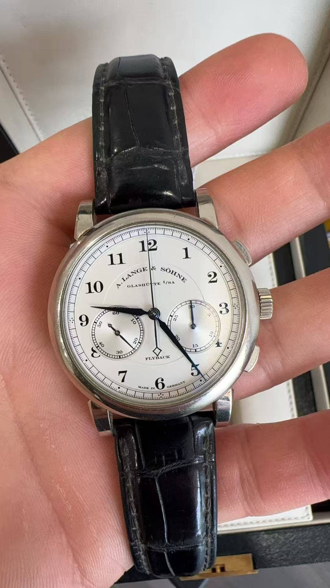 May be an image of wrist watch and text that says 'وه 12 11 1 LANGE 長 SOHNE 1/84 10 끼 BилRHopTK m ல ชบ 6 3 50 0 o මේ มิ ឧ 30 ه i ه 15 FLYBACK 7 MЛEK コ U 6 CRMANY'