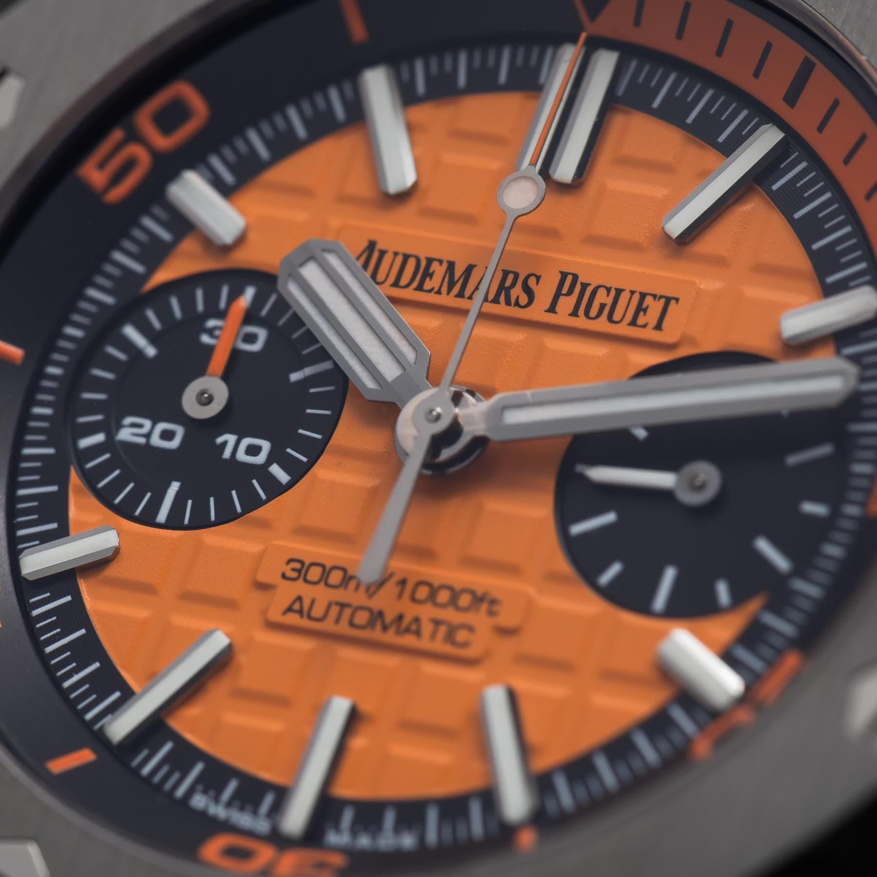 May be an image of wrist watch and text that says 'AUDEM/ AUDEMRS RS PIGUET 20 10 2UTO1000 300 dulutuli / AUTOMATIC 300nd1000 1000t'