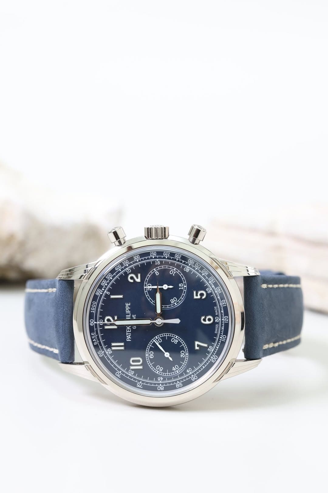 May be an image of wrist watch and text