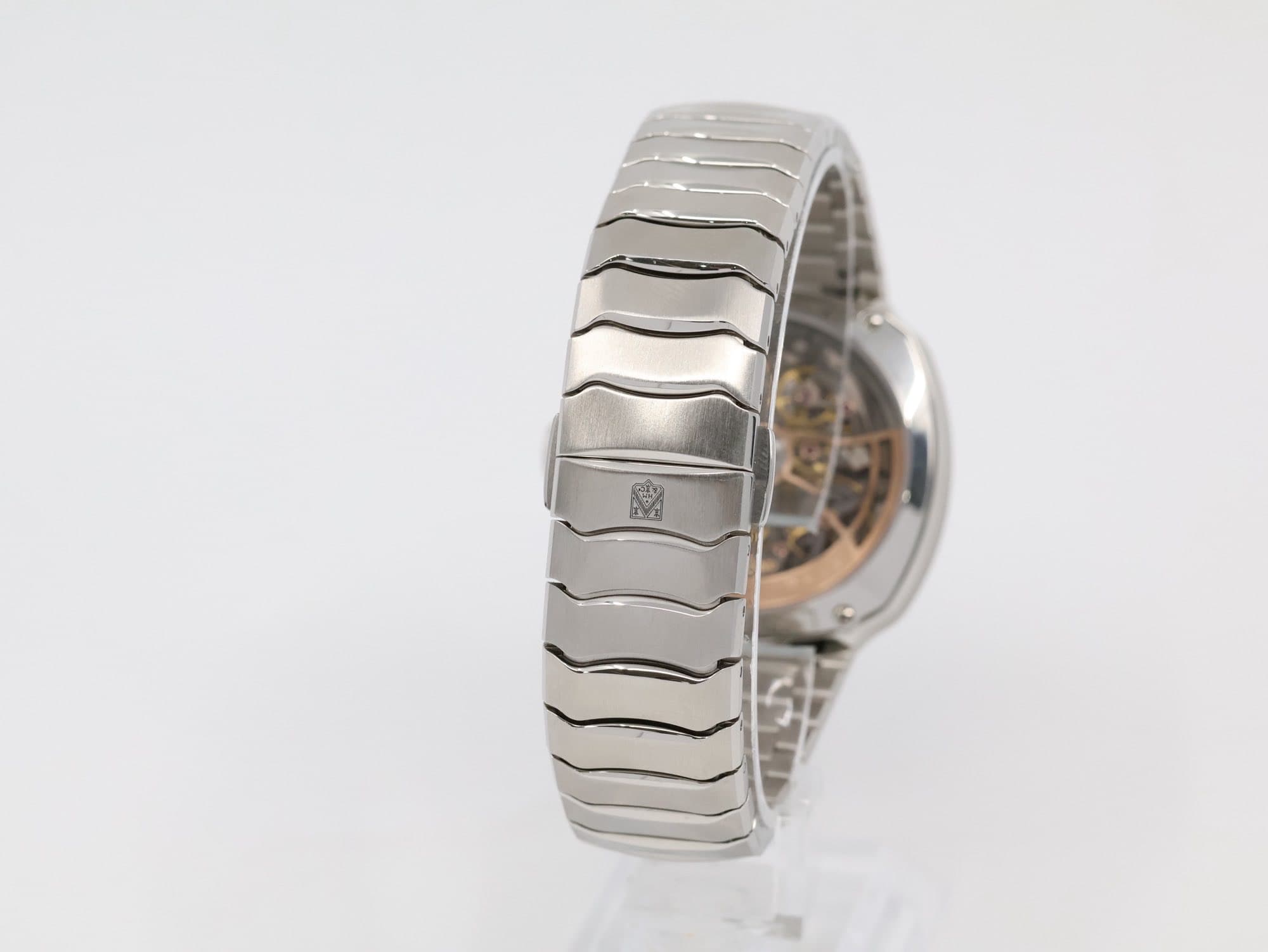 May be an image of jewelry, wrist watch and text