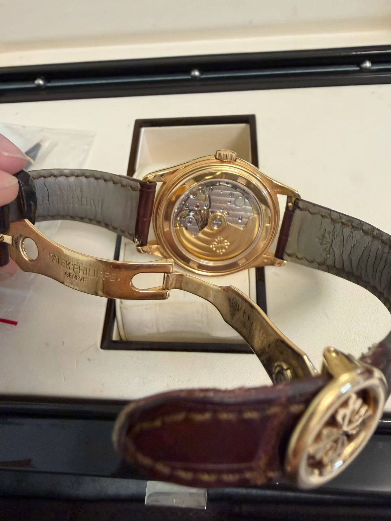 May be an image of wrist watch and text that says 'በሀቤ 治 EK:PHILI d'