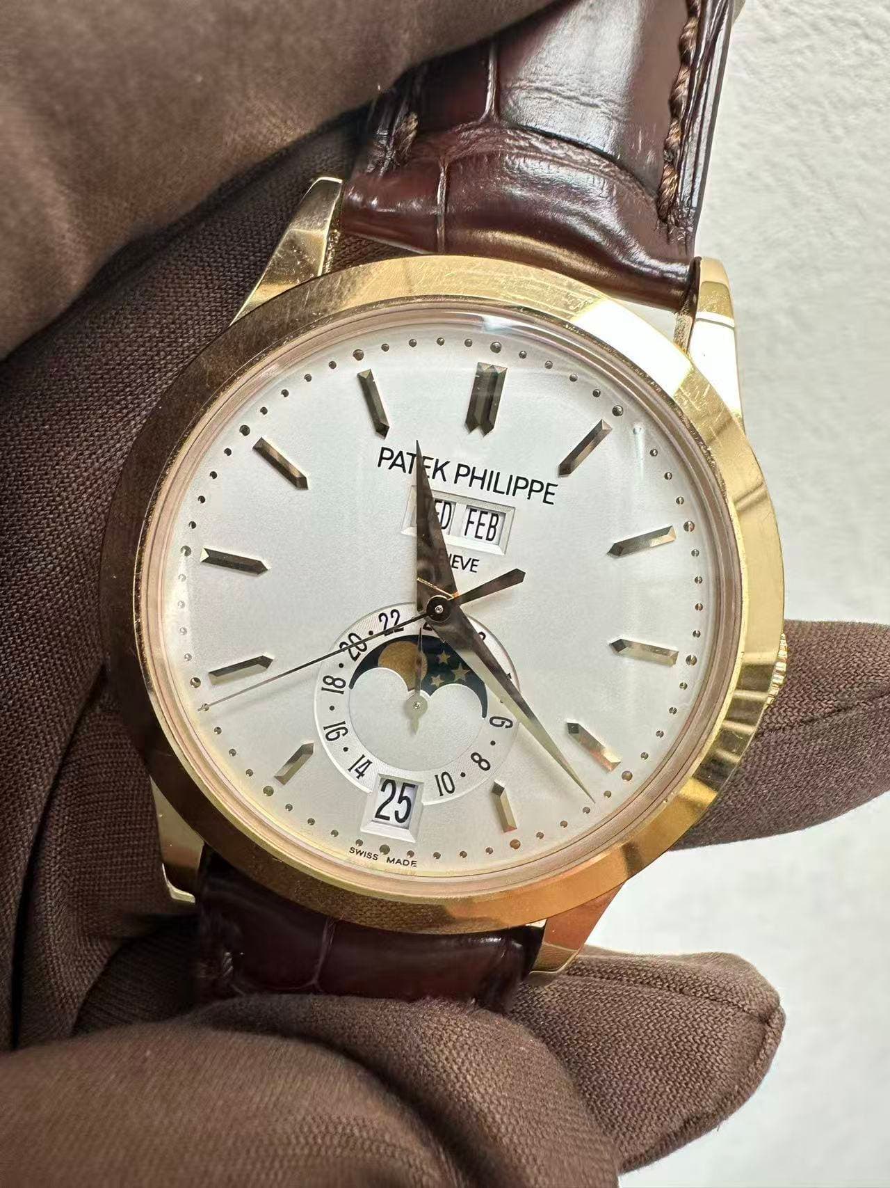 May be an image of wrist watch and text that says 'PAT PATEK PATEKPHILIPPE EK PHILIPPE 0 FEB EVE o a a G 20:22 18 O e တာ รครร MADE 6 o'