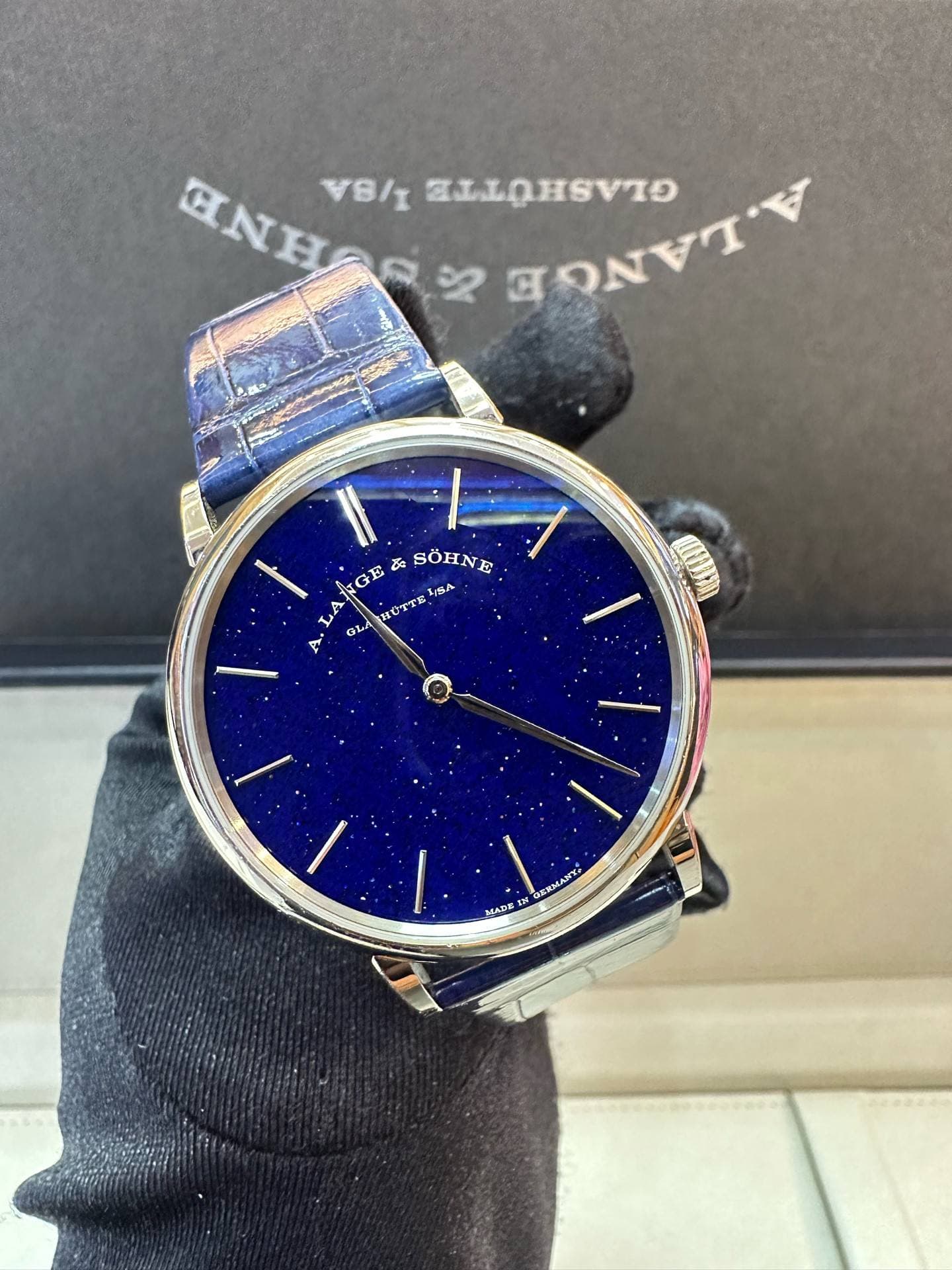 May be an image of wrist watch and text