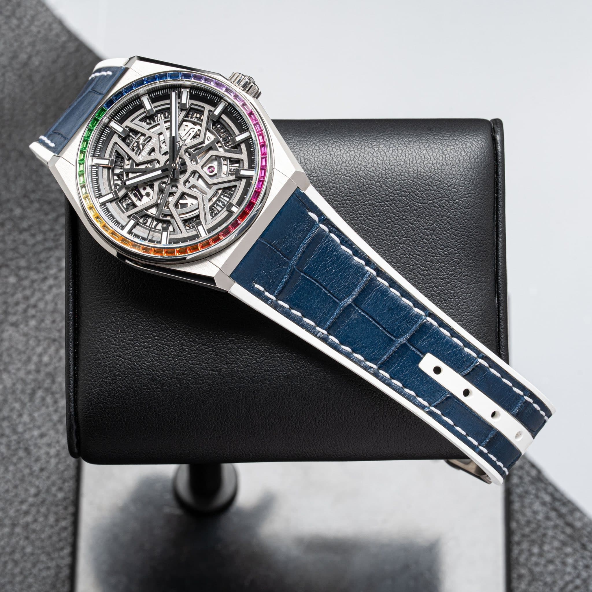 May be an image of wrist watch and text