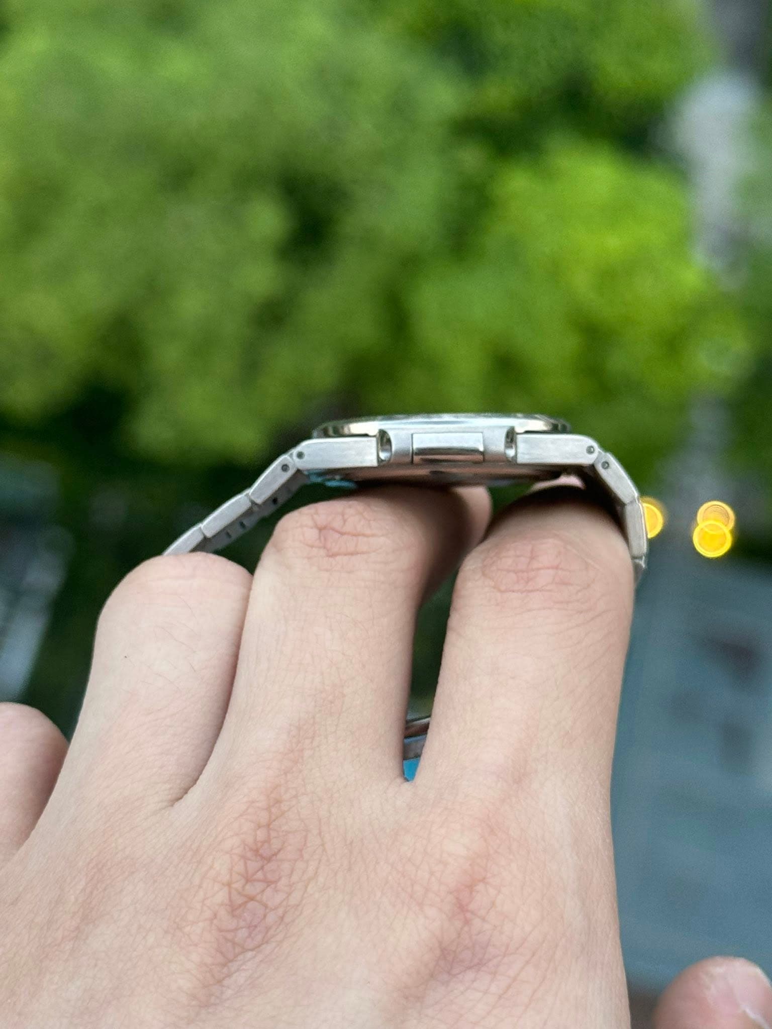 May be an image of digital watch and ring