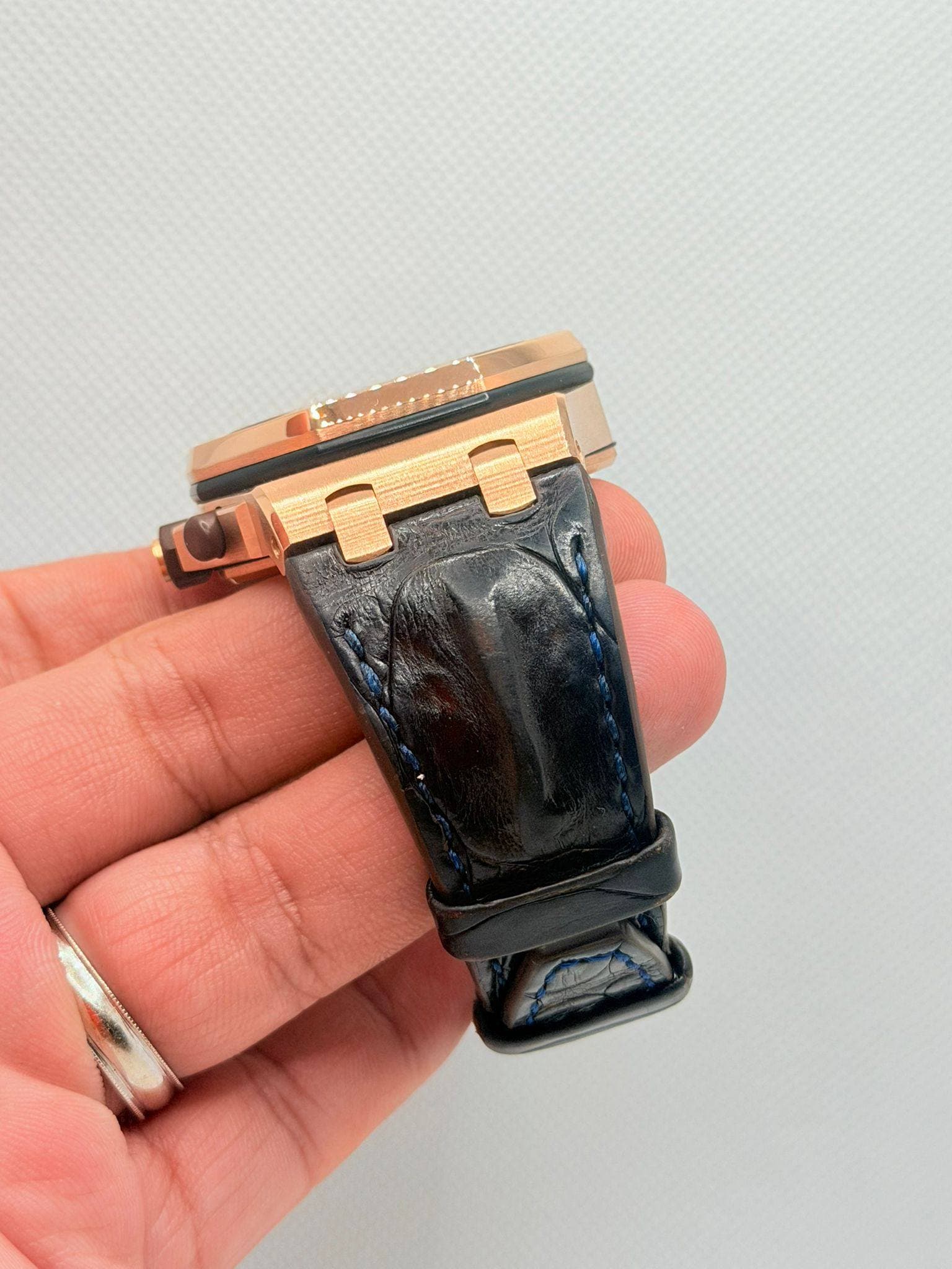 May be an image of digital watch and text