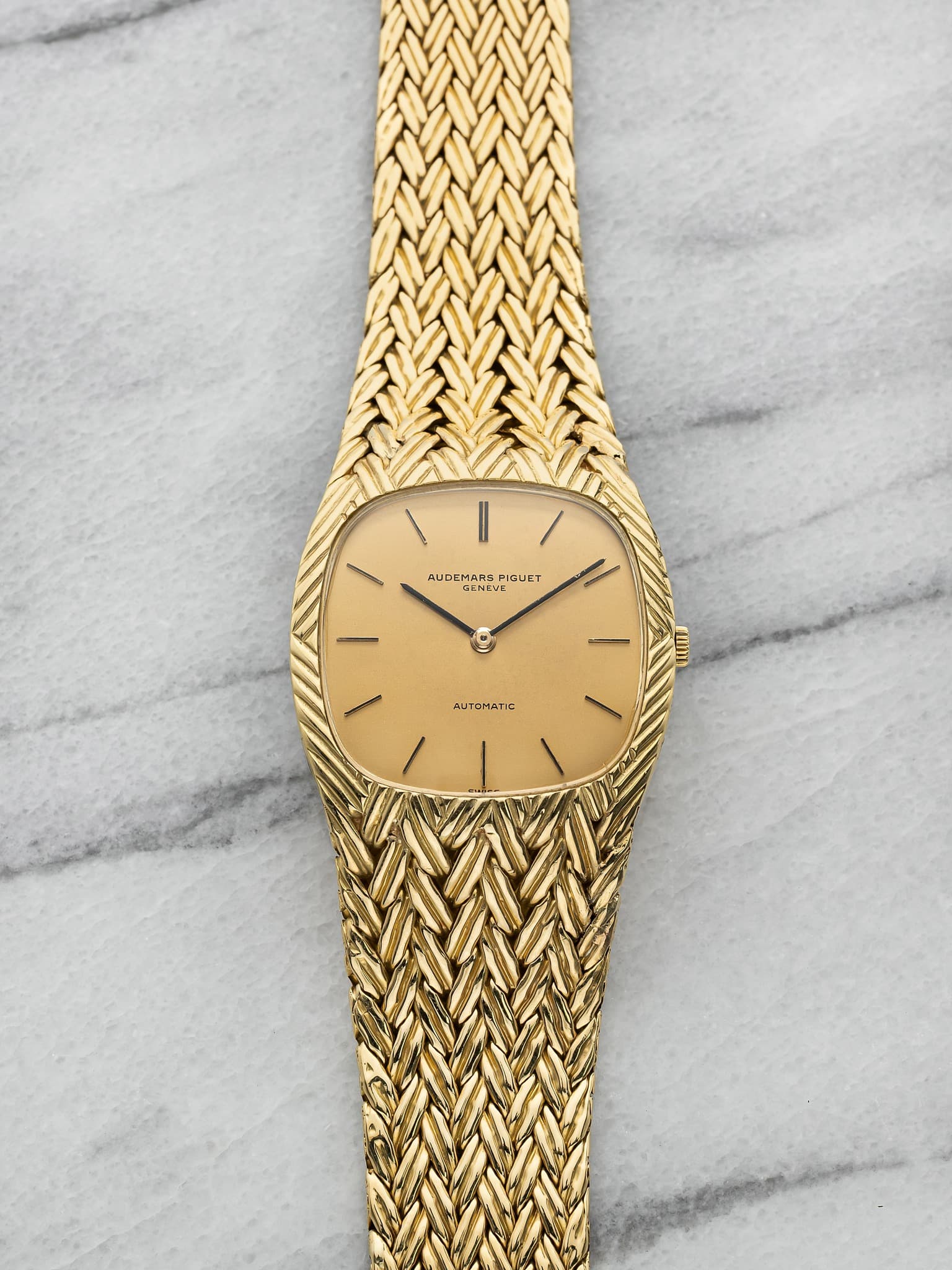 May be an image of wrist watch