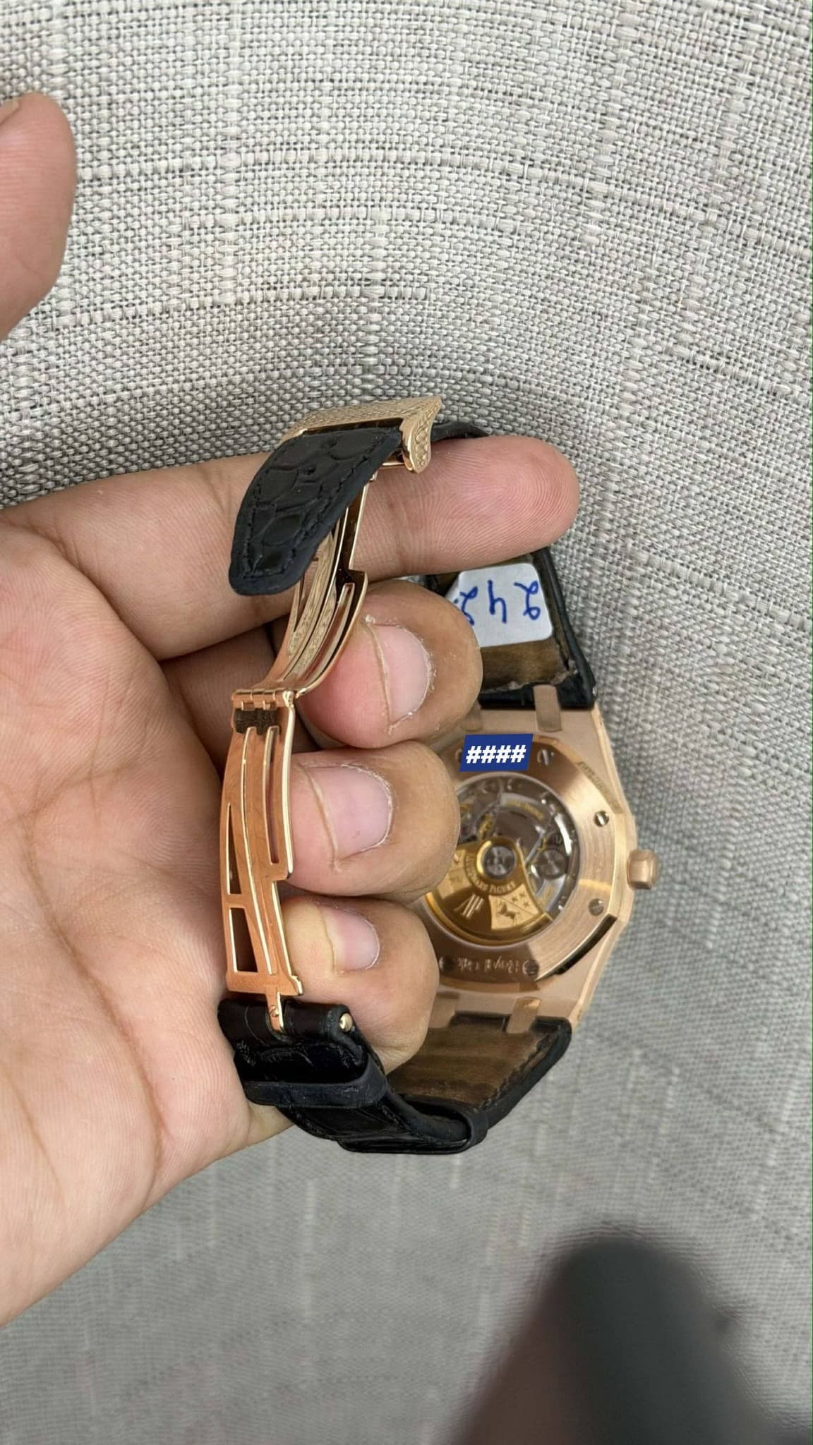 May be an image of digital watch, jewelry and text
