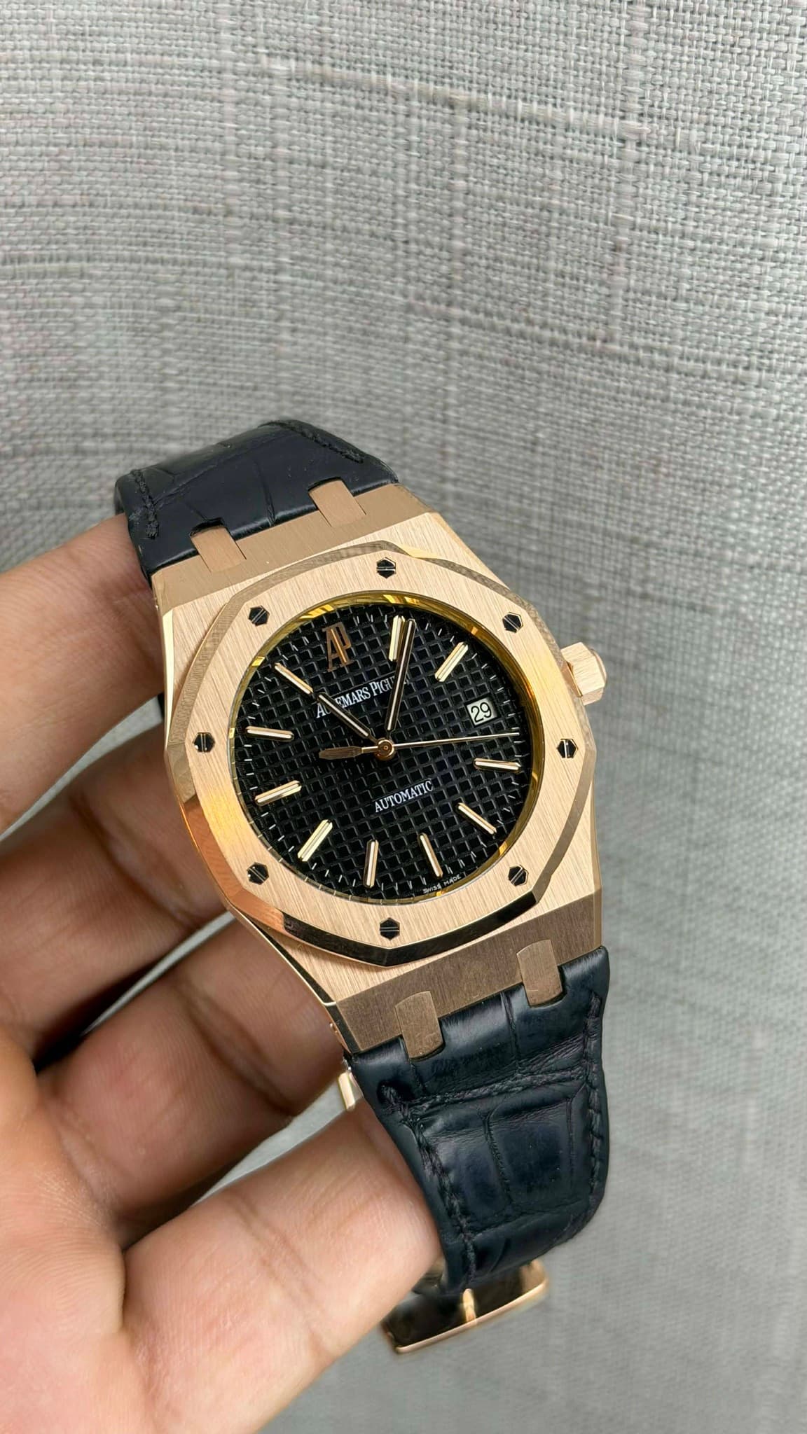 May be an image of wrist watch and text