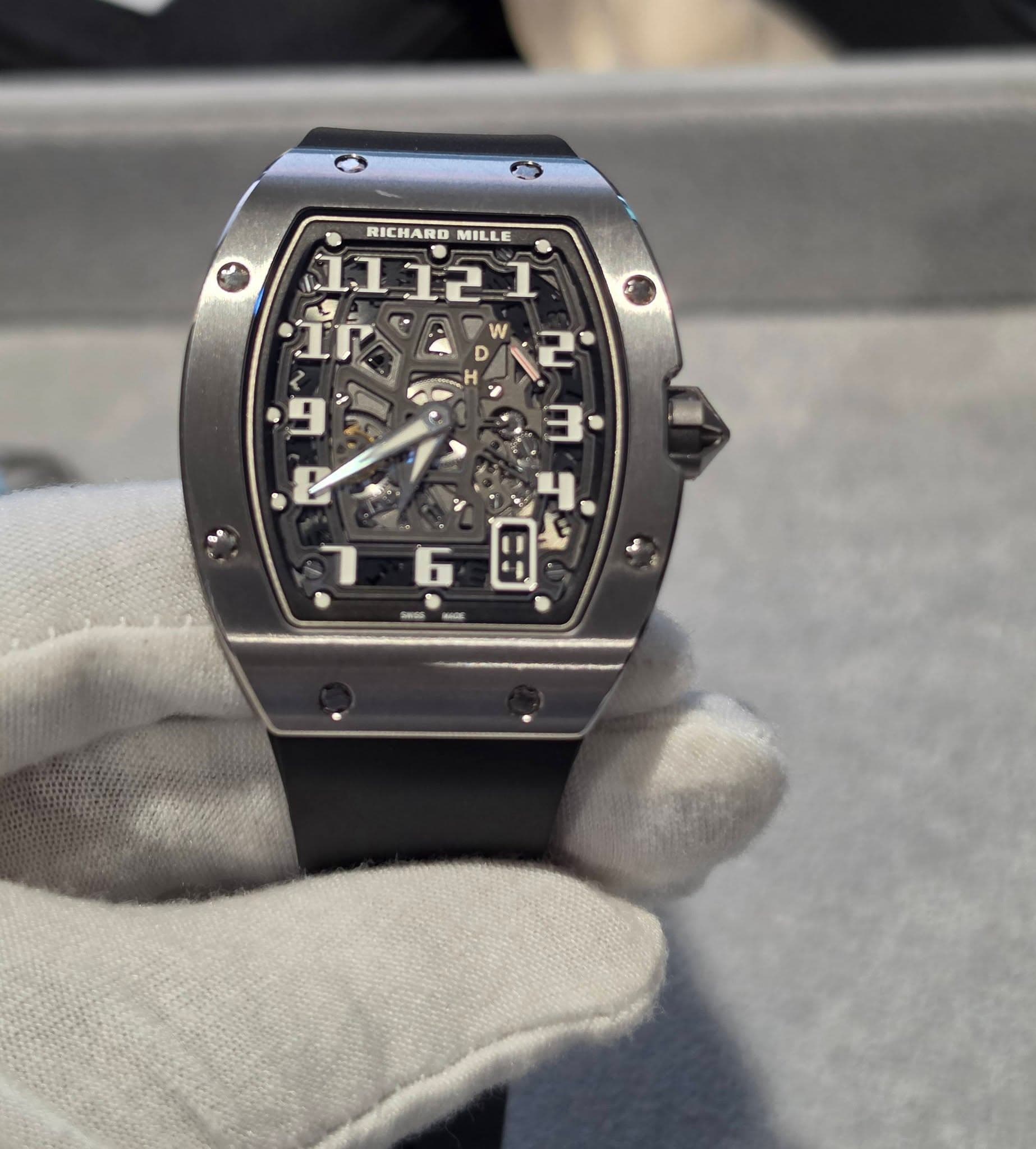 May be an image of wrist watch and text