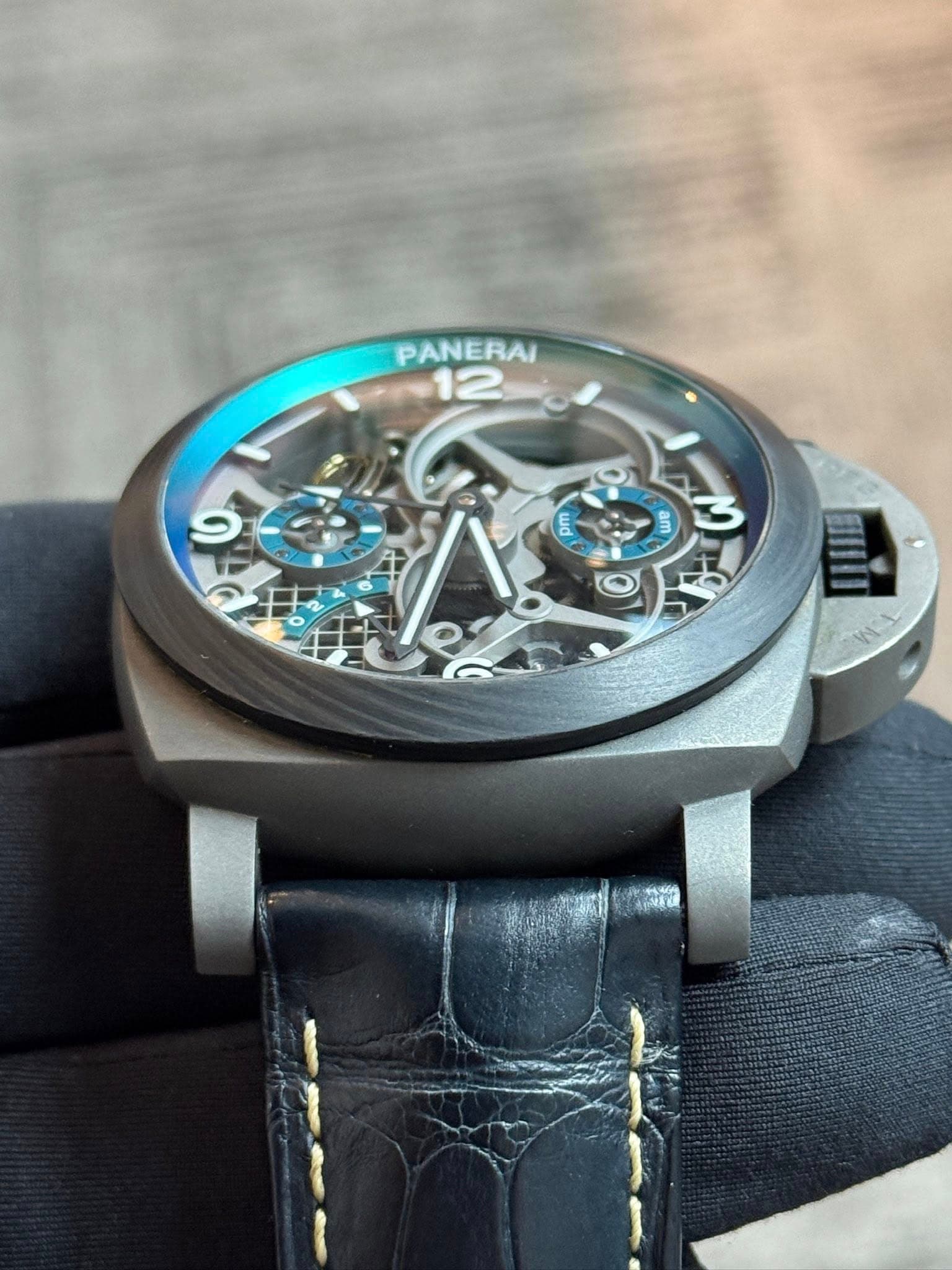 May be an image of wrist watch and text that says 'PANERAI 12 wd am ο مام مل OIL'