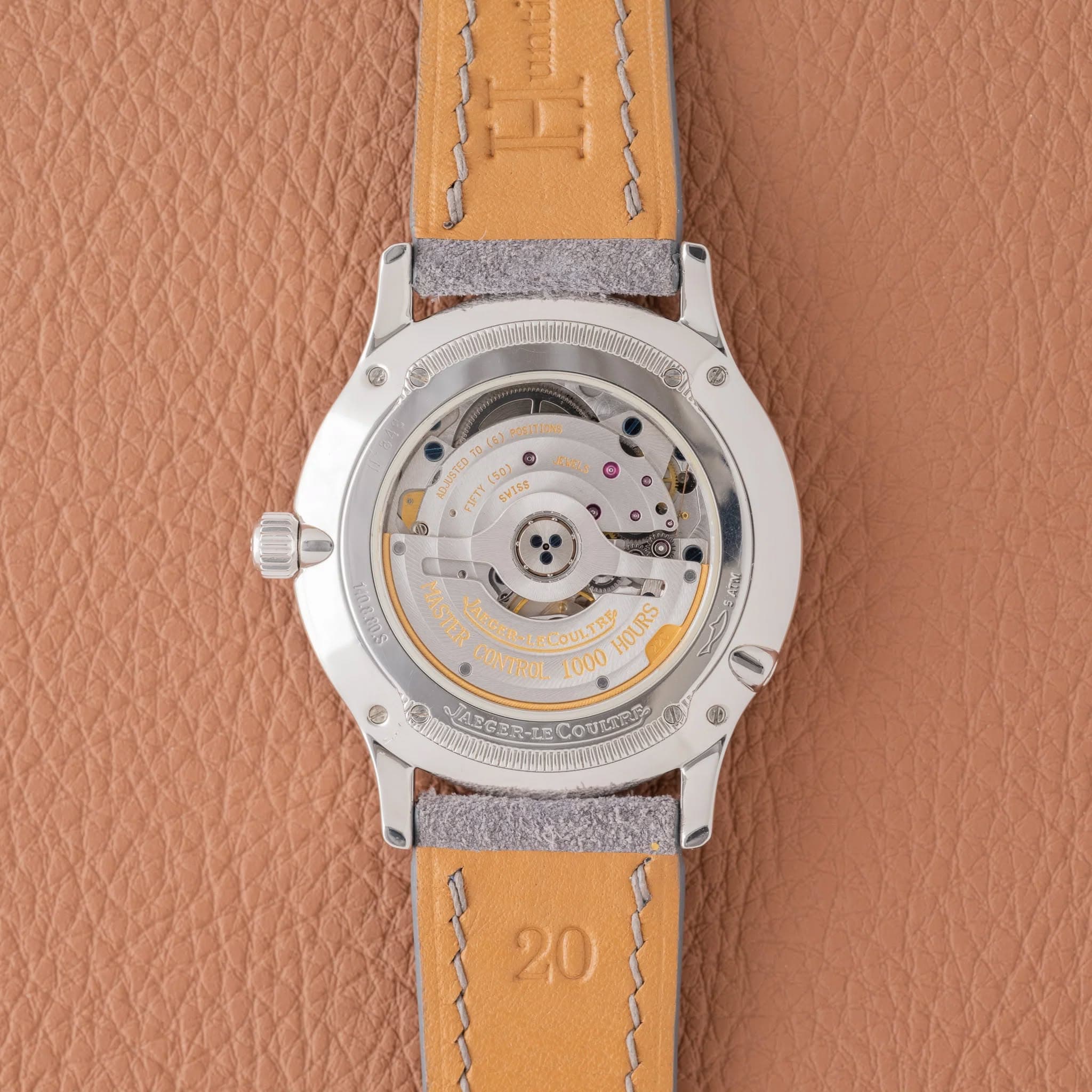 May be an image of wrist watch and text that says '0) d (50) (50) VISS AUSTE JEVIRS ጥያሆን 4 0 P የበኛ HOURS CONTROL 1000 ULTRE 00 ConTE LO 20'